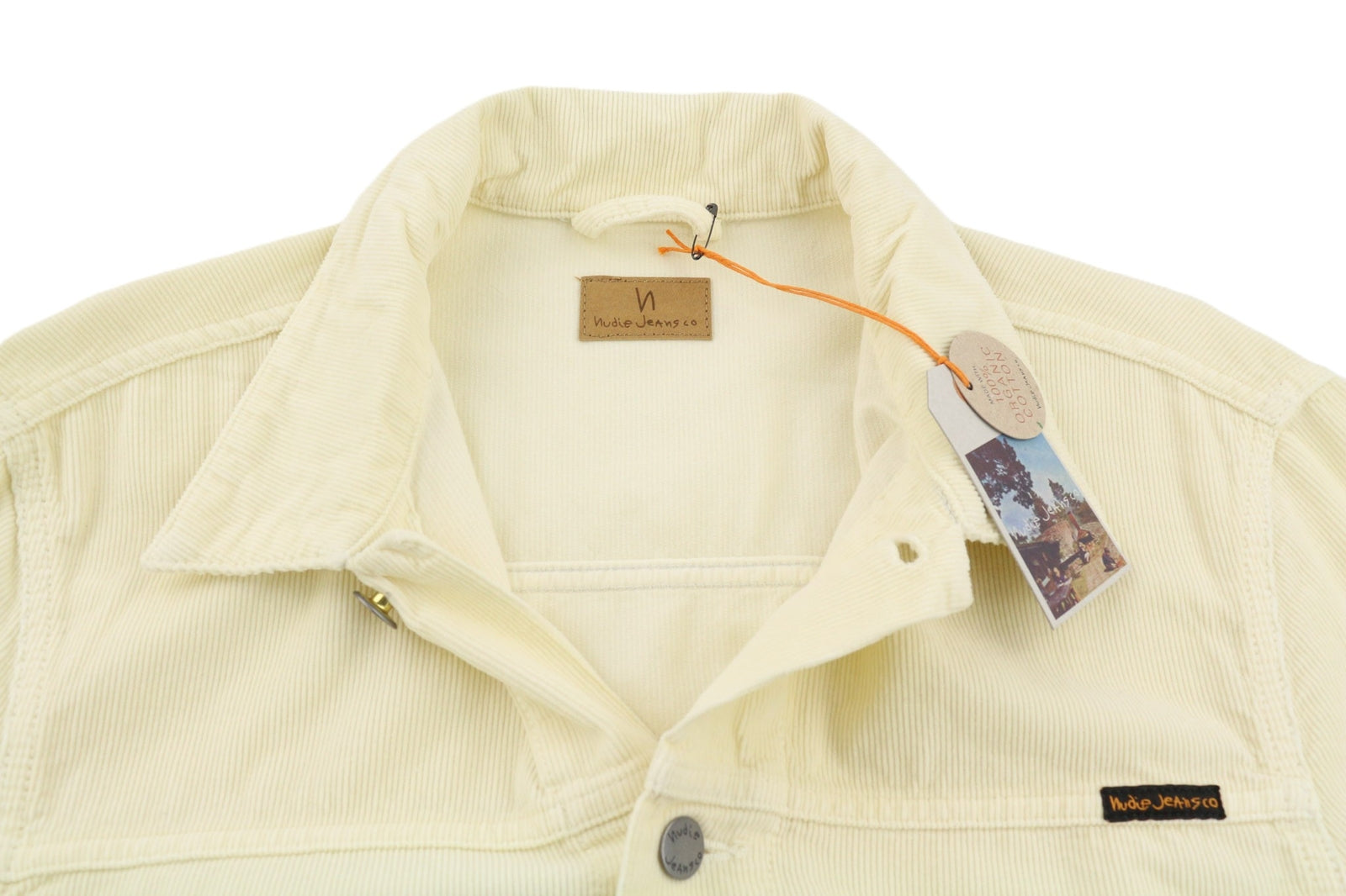 NUDIE JEANS Ronny vyriška striukė L dydžio, dulkėtai balta, ekologiškos medvilnės velveto, su logotipu ir sagomis. 