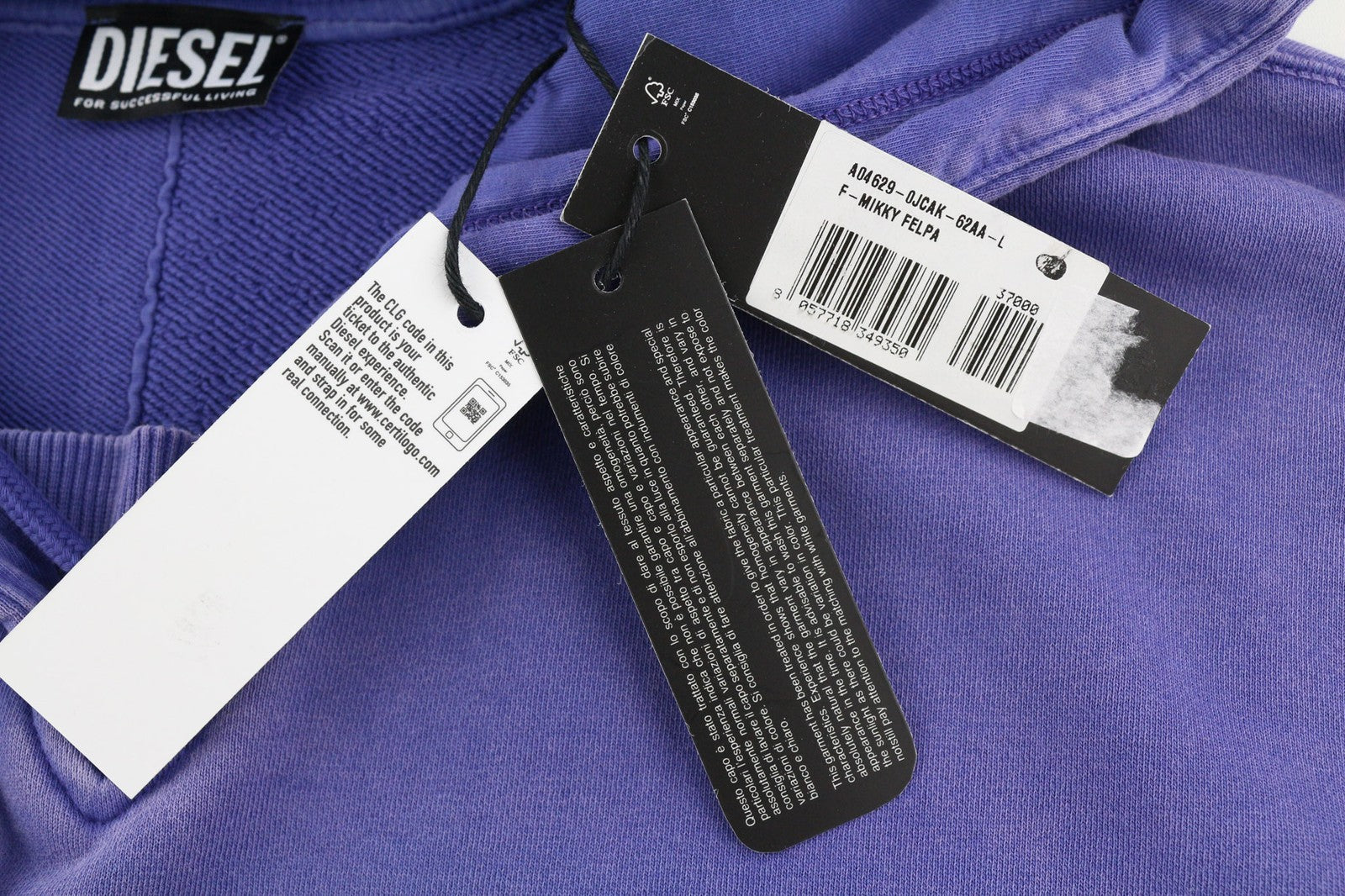 DIESEL F-Mikky moteriškas džemperis su gobtuvu L, mėlynas, asimetriškas, su gobtuvu ir plauto rašto efektu, rekomenduojama kaina – 135 € 