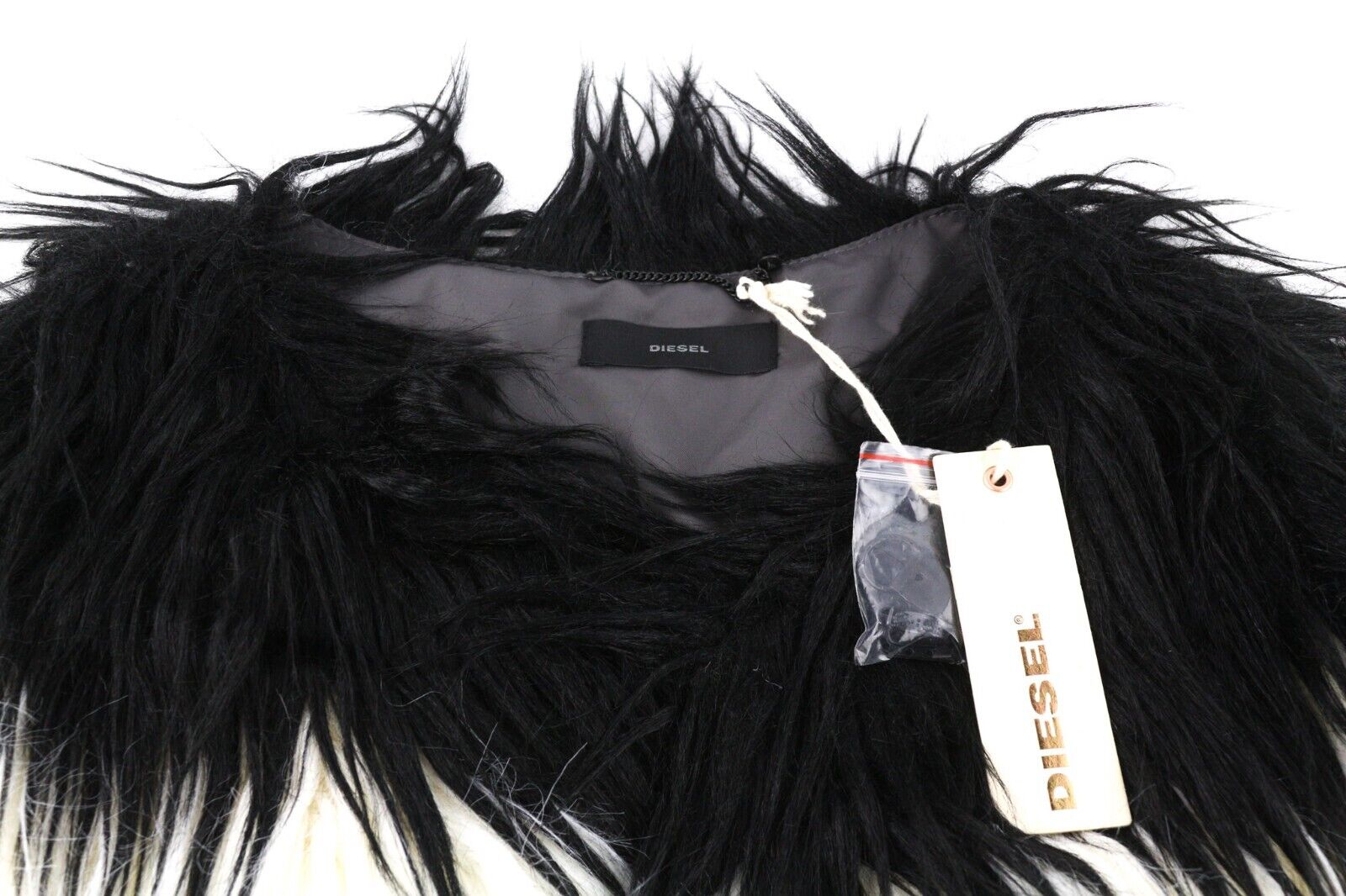 DIESEL L-Angus-A moteriška liemenė M su dirbtiniu kailiu, pūkuotu dryžuotu sijonu ir kišenėmis, juoda ir balta. 