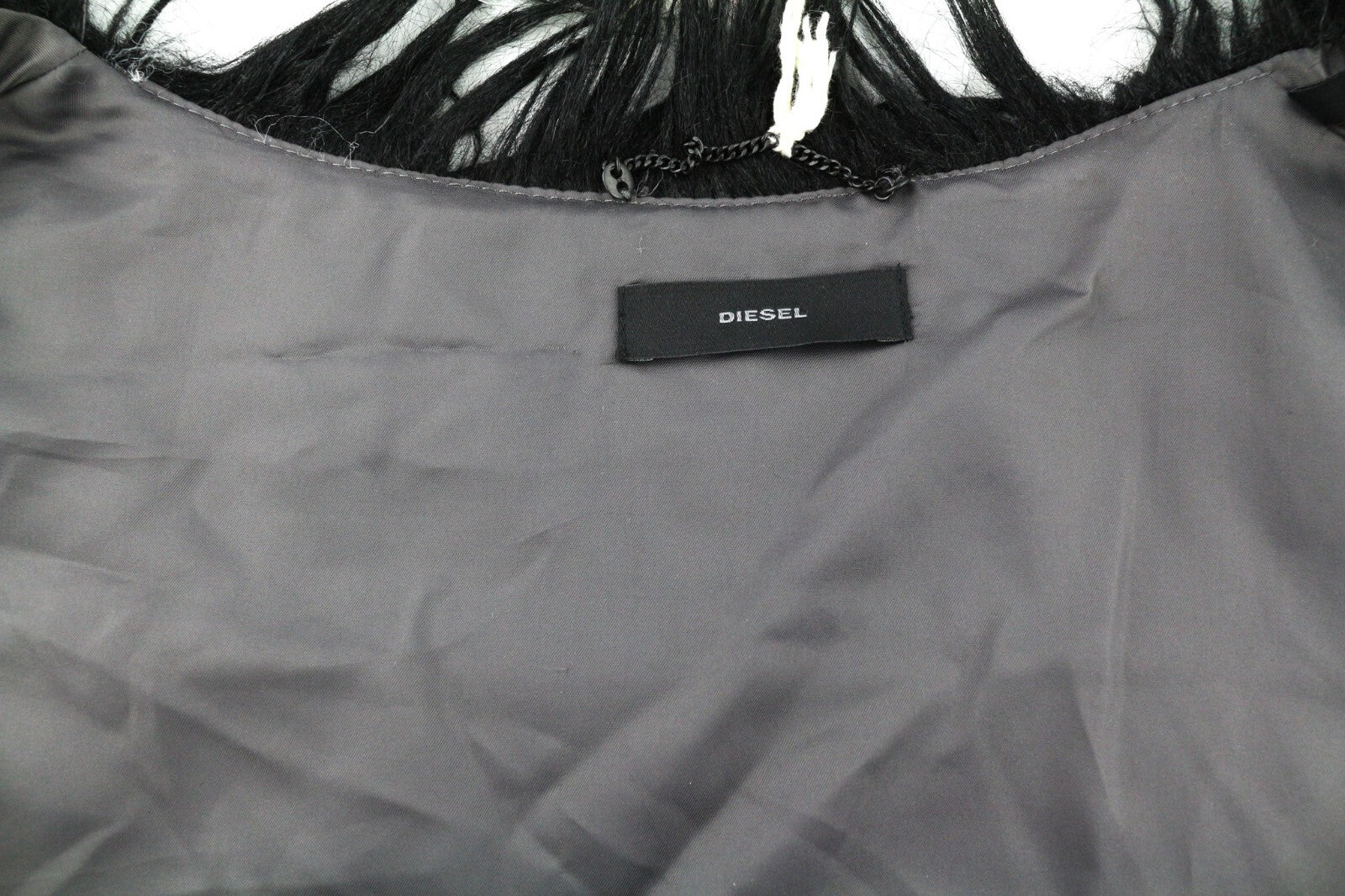 DIESEL L-Angus-A moteriška liemenė M su dirbtiniu kailiu, pūkuotu dryžuotu sijonu ir kišenėmis, juoda ir balta. 