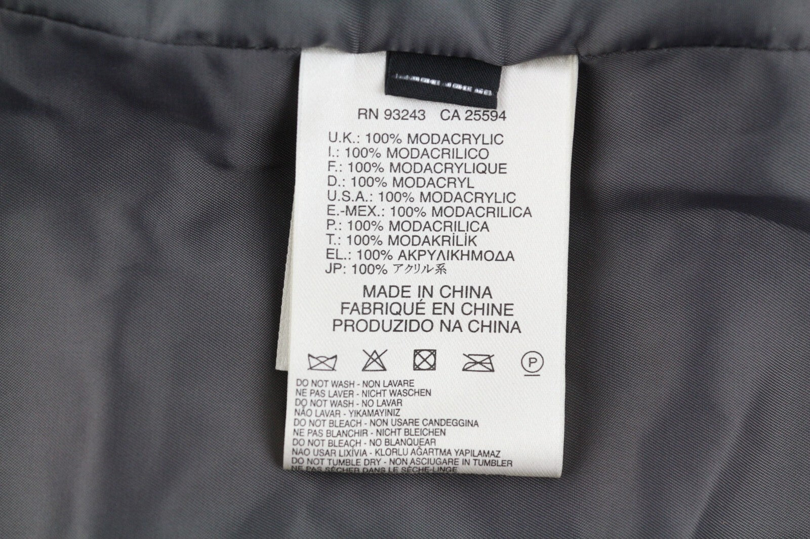 DIESEL L-Angus-A moteriška liemenė M su dirbtiniu kailiu, pūkuotu dryžuotu sijonu ir kišenėmis, juoda ir balta. 