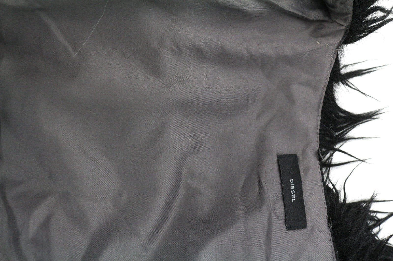 DIESEL L-Angus-A moteriška liemenė L su dirbtiniu kailiu, pūkuotu dryžuotu pamušalu, juoda ir balta 