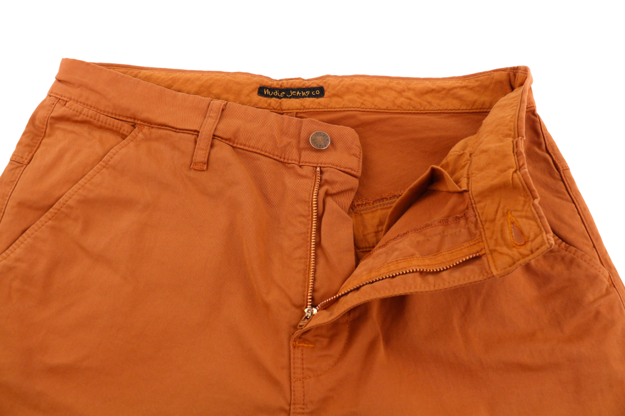 NUDIE Khaki Slim vyriškos kelnės W33/L32 ekologiškos šiltos oranžinės spalvos su užtrauktuku ir logotipu chino stiliaus 