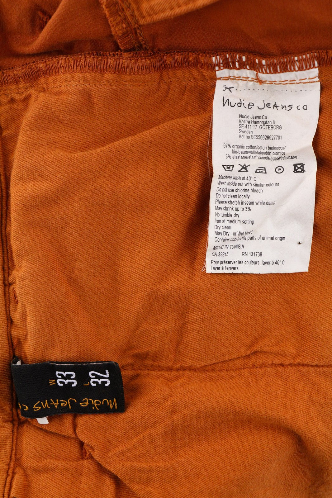 NUDIE Khaki Slim vyriškos kelnės W33/L32 ekologiškos šiltos oranžinės spalvos su užtrauktuku ir logotipu chino stiliaus 