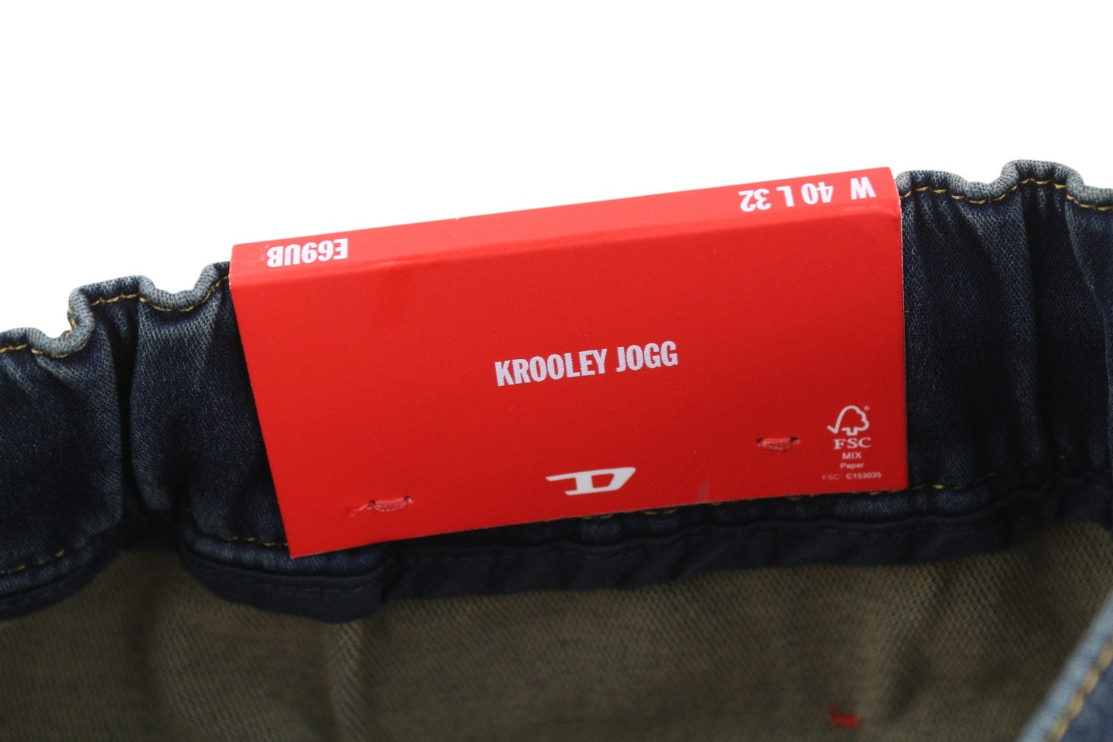 DIESEL Krooley Jogg E69UB vyriški džinsai W40/L32 tamprūs, siaurėjantys, skalbtos mėlynos spalvos, rekomenduojama kaina – 295 € 