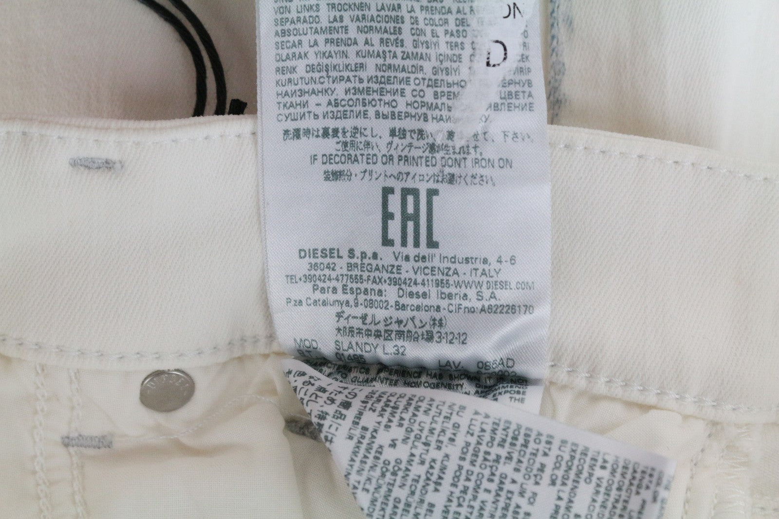 DIESEL Slandy 086AD moteriškos aptemptos džinsinės kelnės W26/L32 itin plonos, tamprios, baltos... 