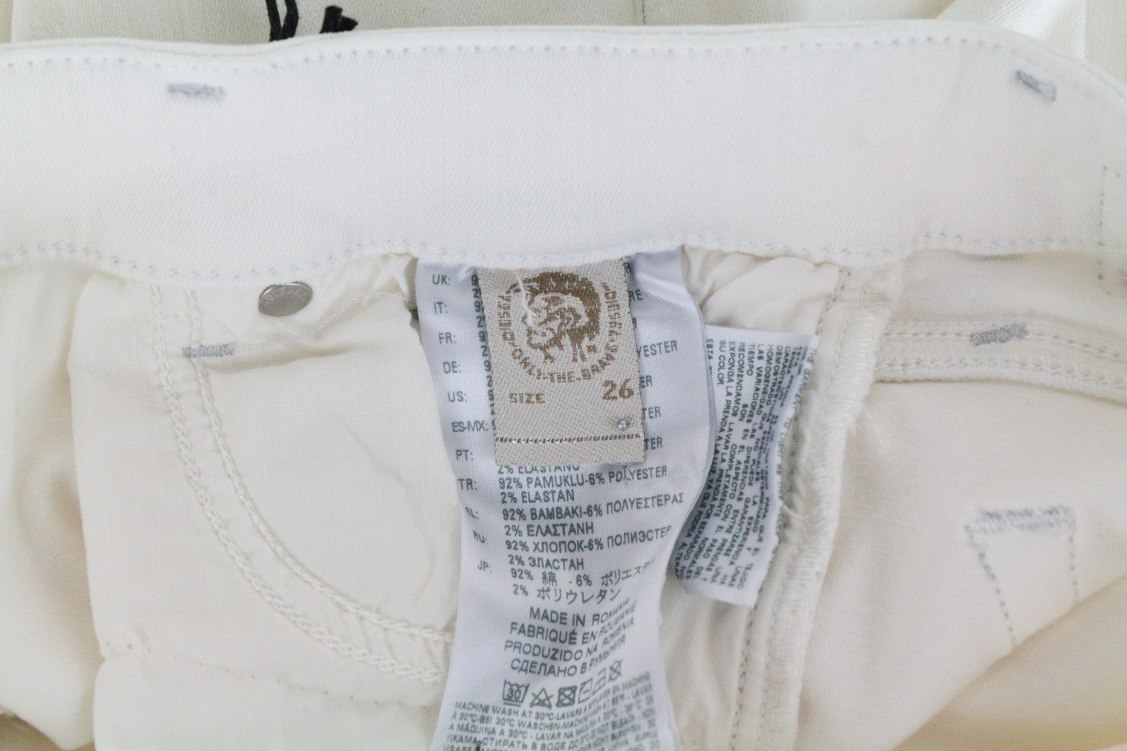 DIESEL Slandy 086AD moteriškos aptemptos džinsinės kelnės W26/L32 itin plonos, tamprios, baltos... 