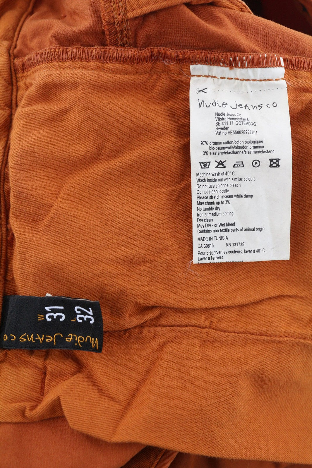 NUDIE Khaki Slim vyriškos kelnės W31/L32 ekologiškos šiltos oranžinės spalvos su užtrauktuku ir logotipu chino stiliaus 