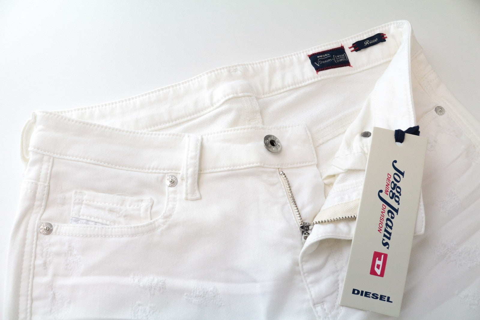 DIESEL Rizzo-NE 0672D W25 balti medvilniniai tamprūs Jogg Slim Fit moteriški džinsai 