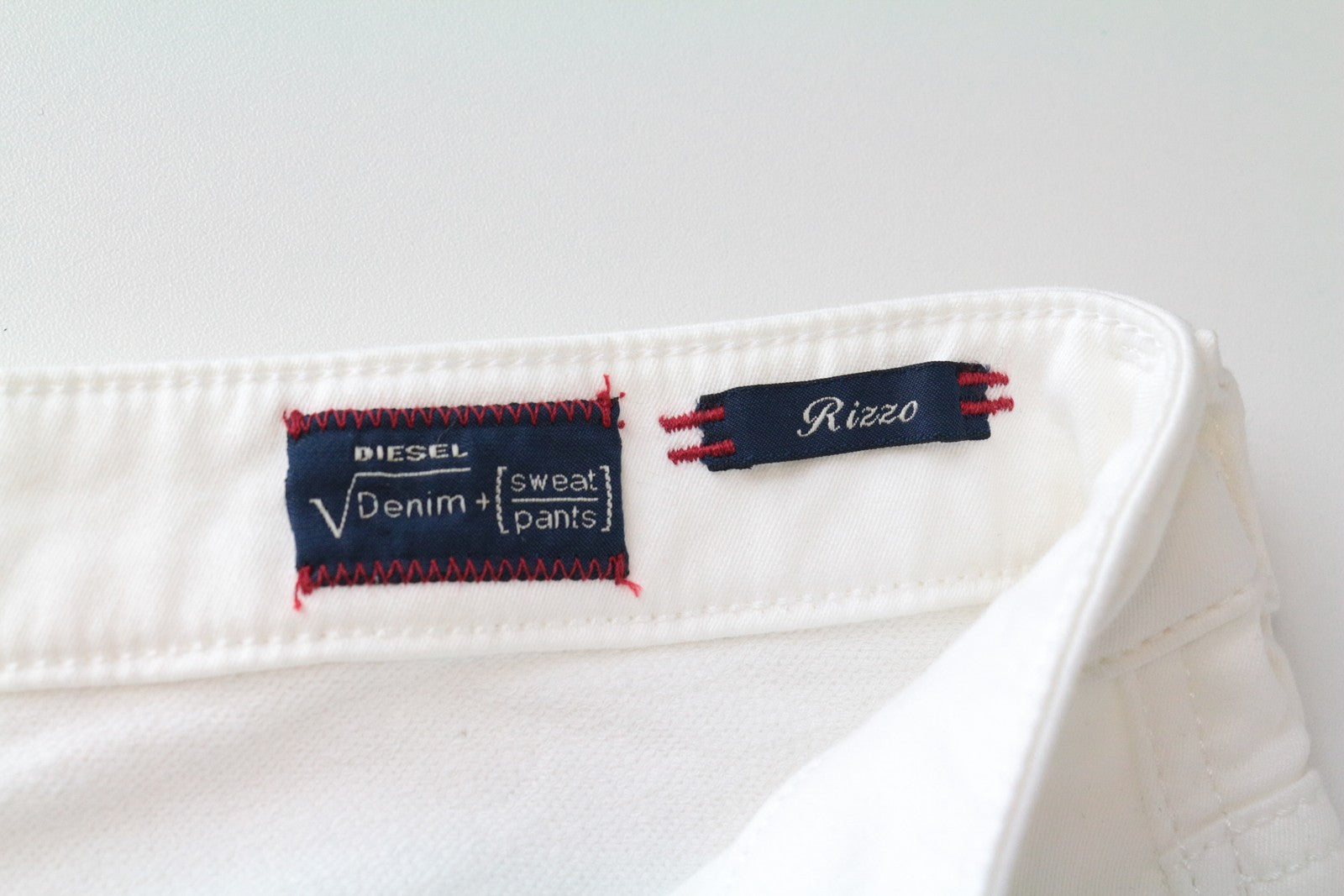 DIESEL Rizzo-NE 0672D W25 balti medvilniniai tamprūs Jogg Slim Fit moteriški džinsai 
