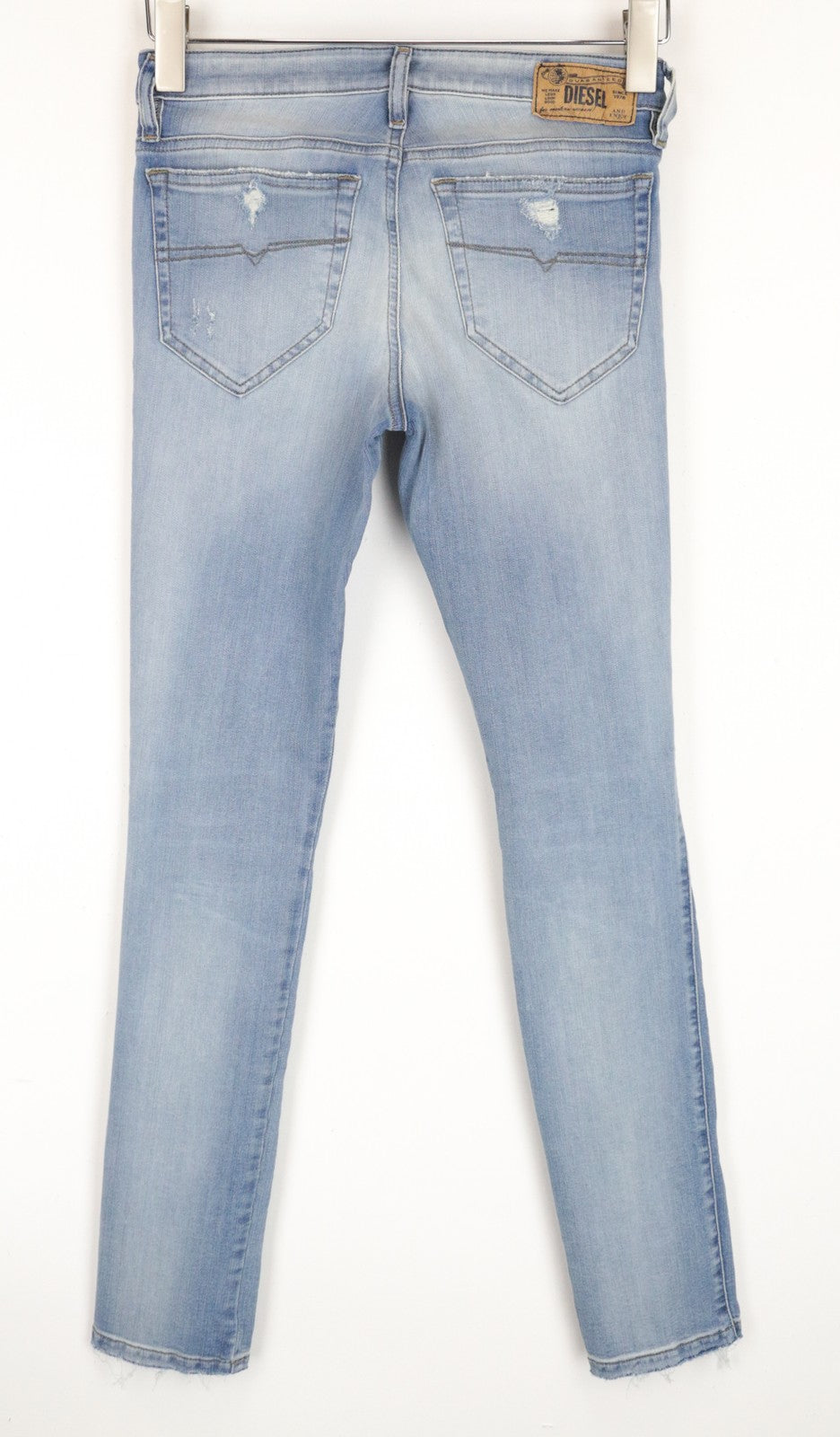 DIESEL Skinzee R4TM8 W26/L30 mėlyni plėšyti, ploni, aptempti moteriški džinsai 