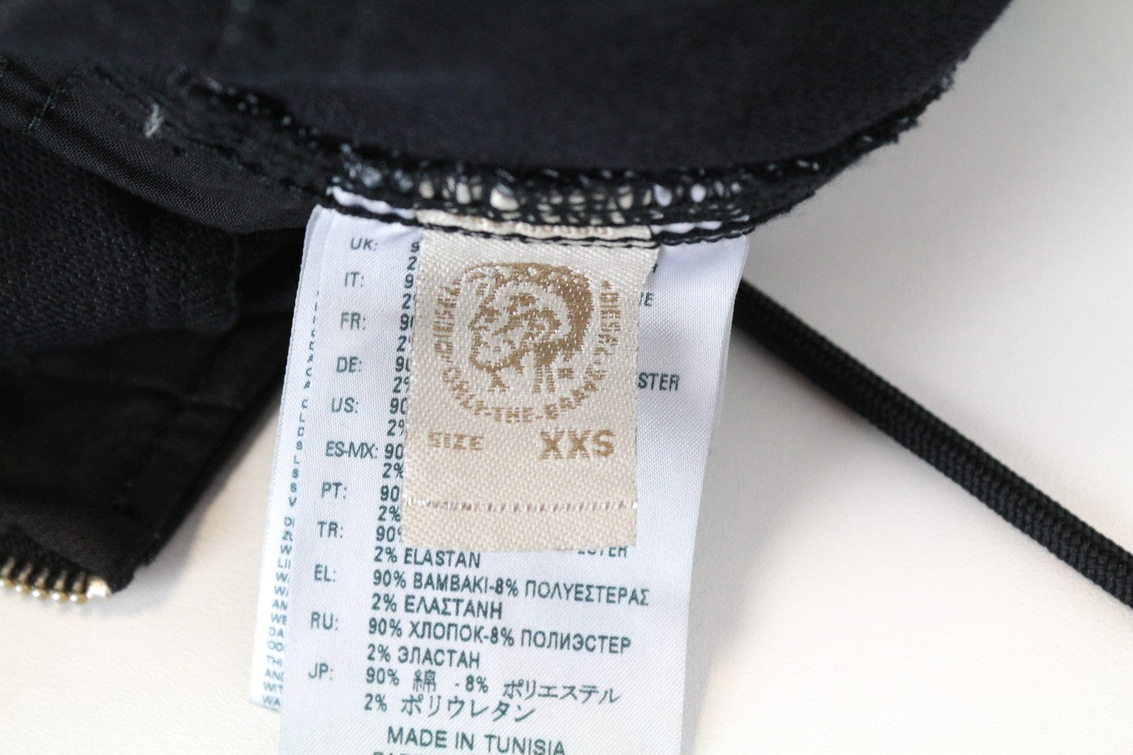 DIESEL D-Inder-Ne 0686E XS juodas tamprus moteriškas kombinezonas siaurėjantis jogg stiliaus 