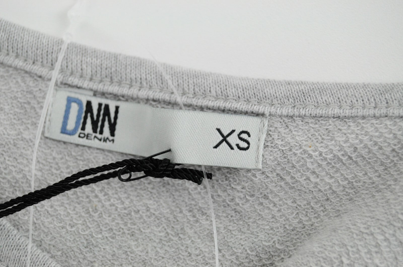 DNN moteriškas džemperis pilkas ilgomis rankovėmis su medvilniniu užrašu XS dydžio 