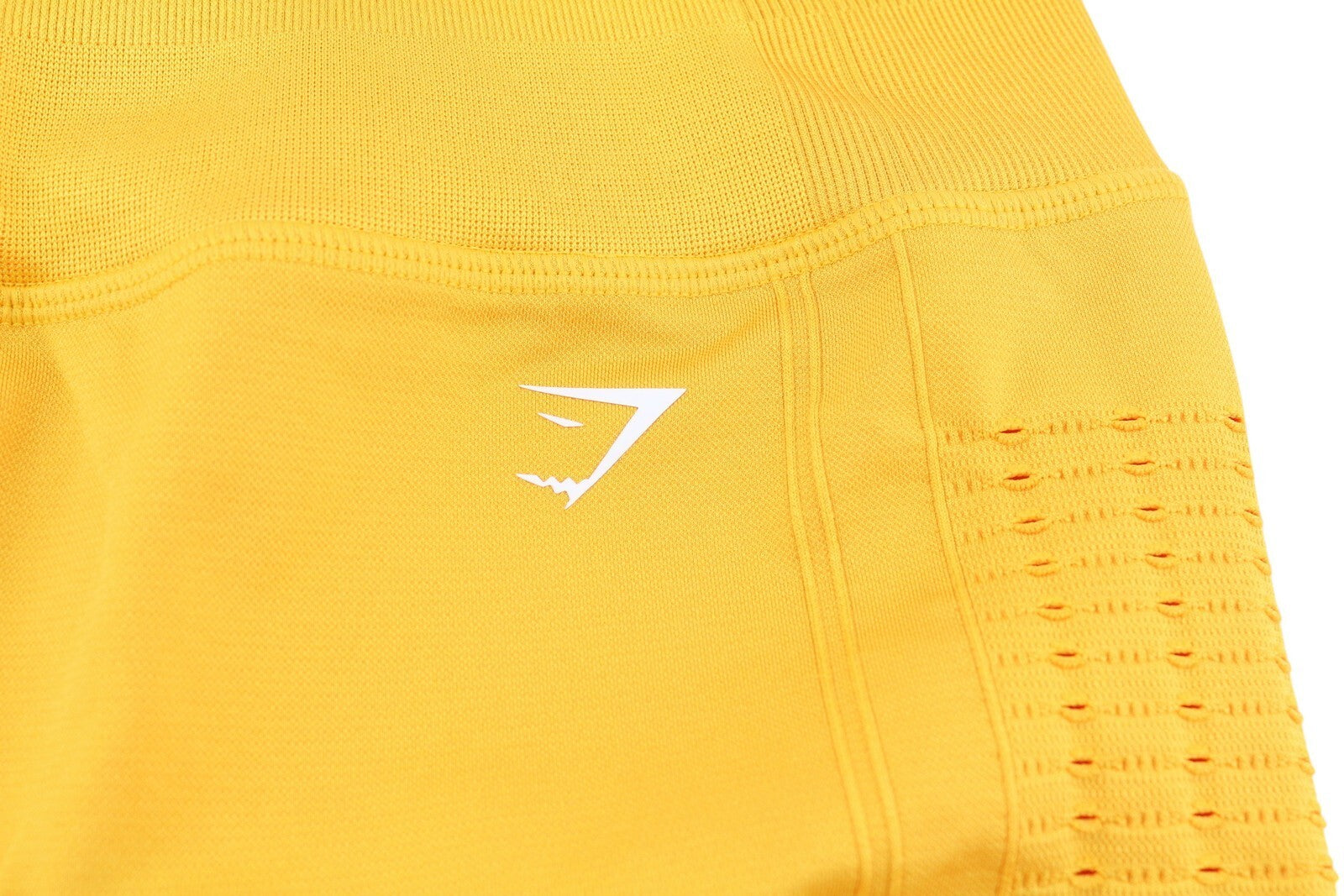 GYMSHARK Glow moteriški šortai XL dydžio, geltoni, besiūliai, tamprūs, aukštu juosmeniu, iškirpte. 