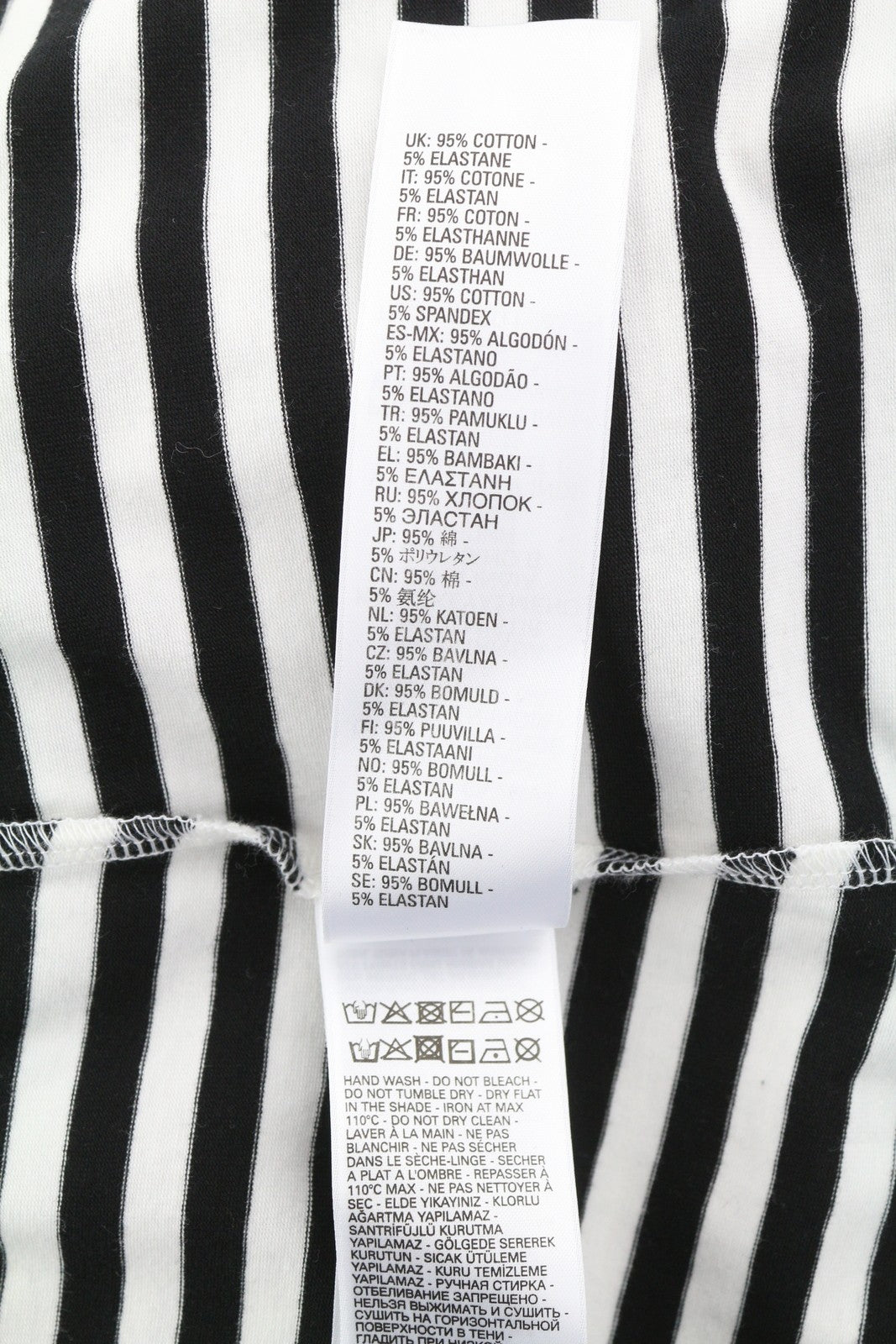 DIESEL T-Amos moteriški marškinėliai be rankovių, dryžuoti, apvaliu kaklu, balti ir juodi.