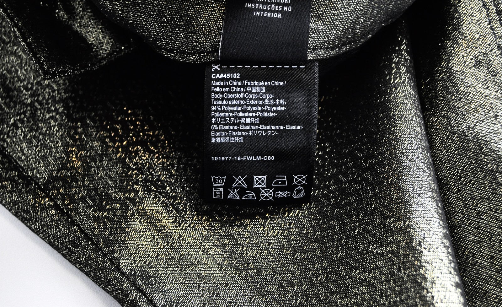 MAISON SCOTCH W24 L32 moteriški blizgučiais ir užtrauktuku aptempti džinsai su vidutinio liemens raštu 