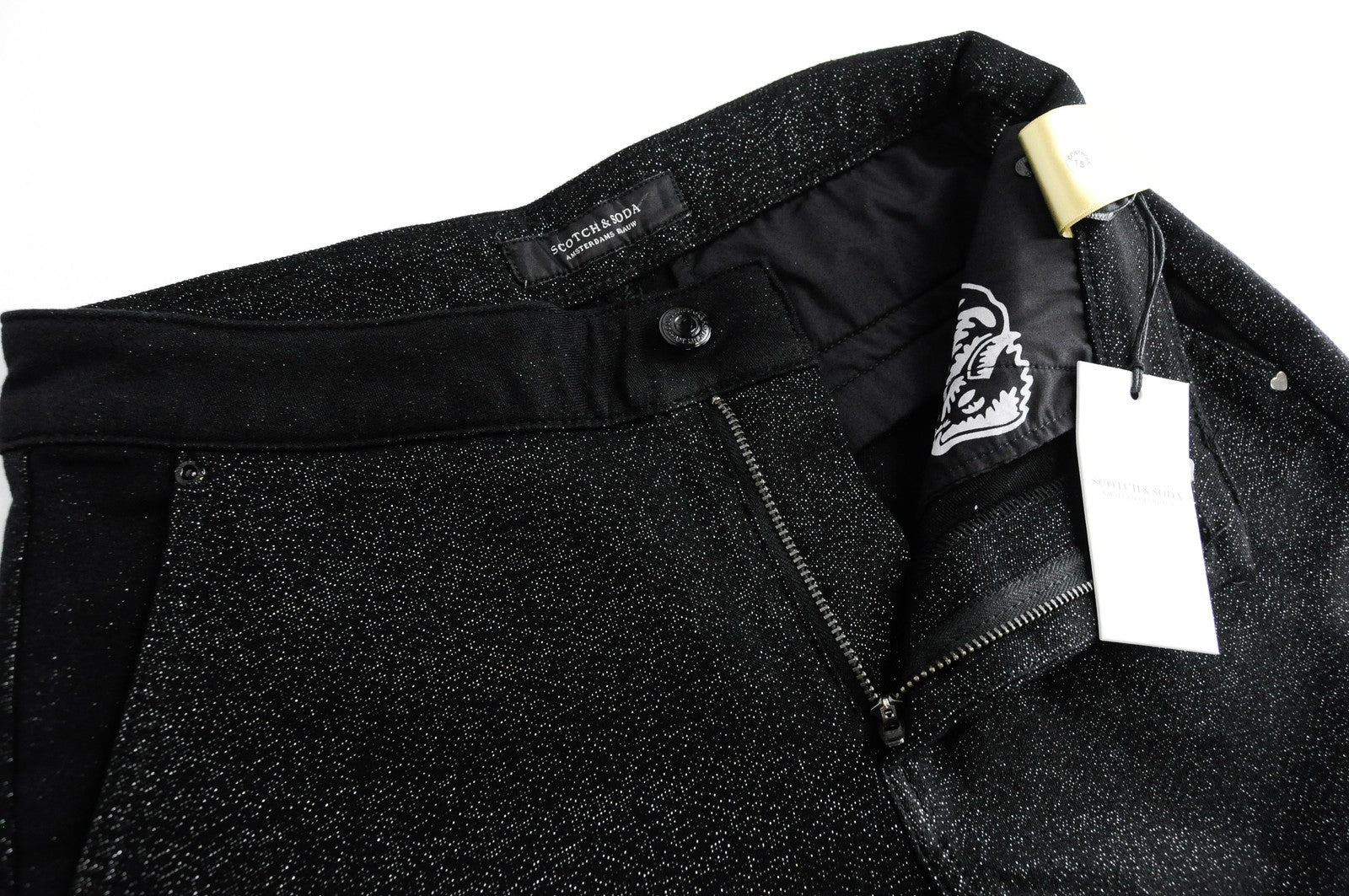 MAISON SCOTCH W26 L32 juodi, blizgučiais ir aptempti moteriški džinsai su vidutinio liemens juosta. 