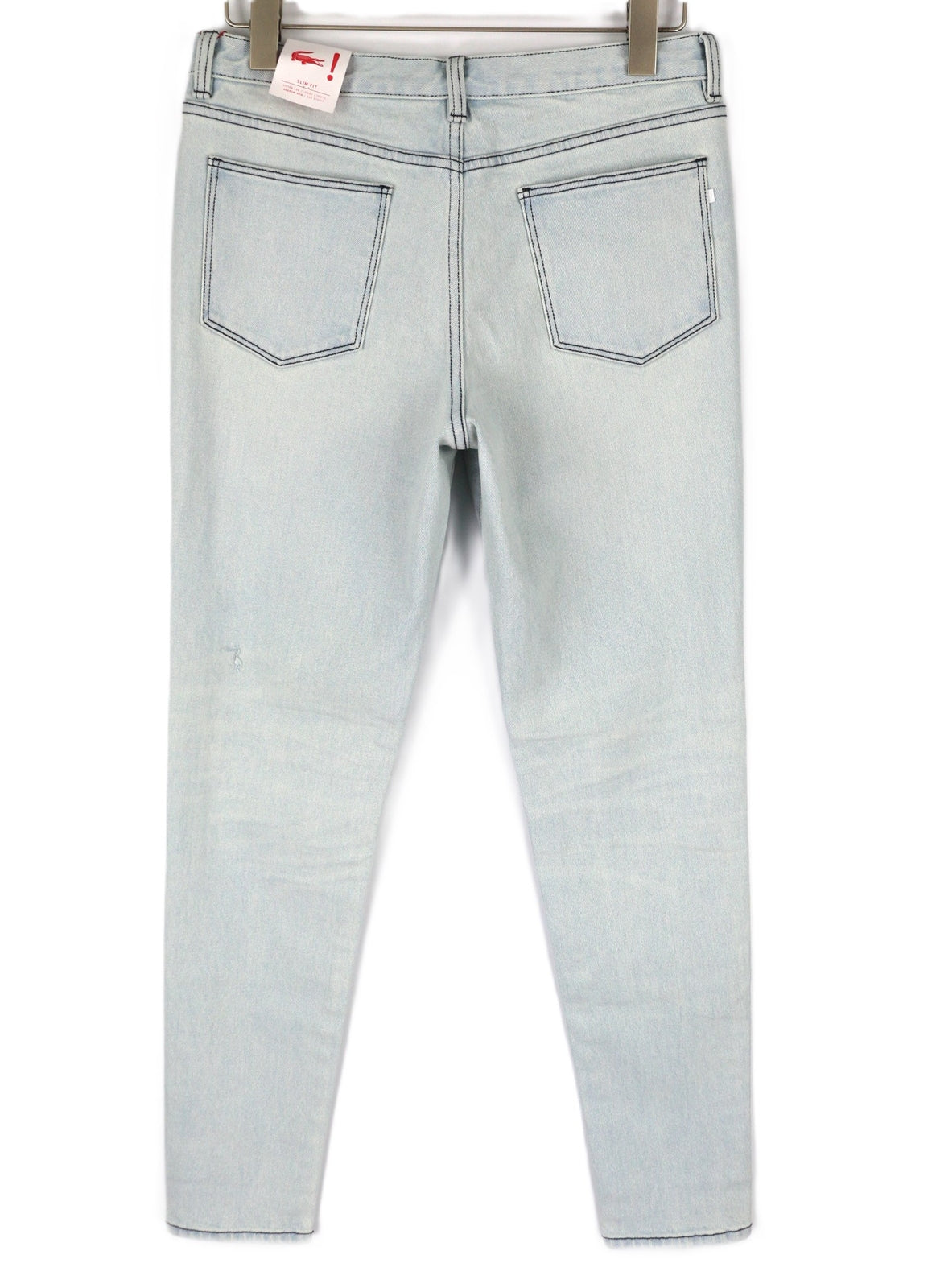 LACOSTE HF2897 moteriški džinsai W30 skalbtos mėlynos medvilnės tamprūs, siaurėjantys 