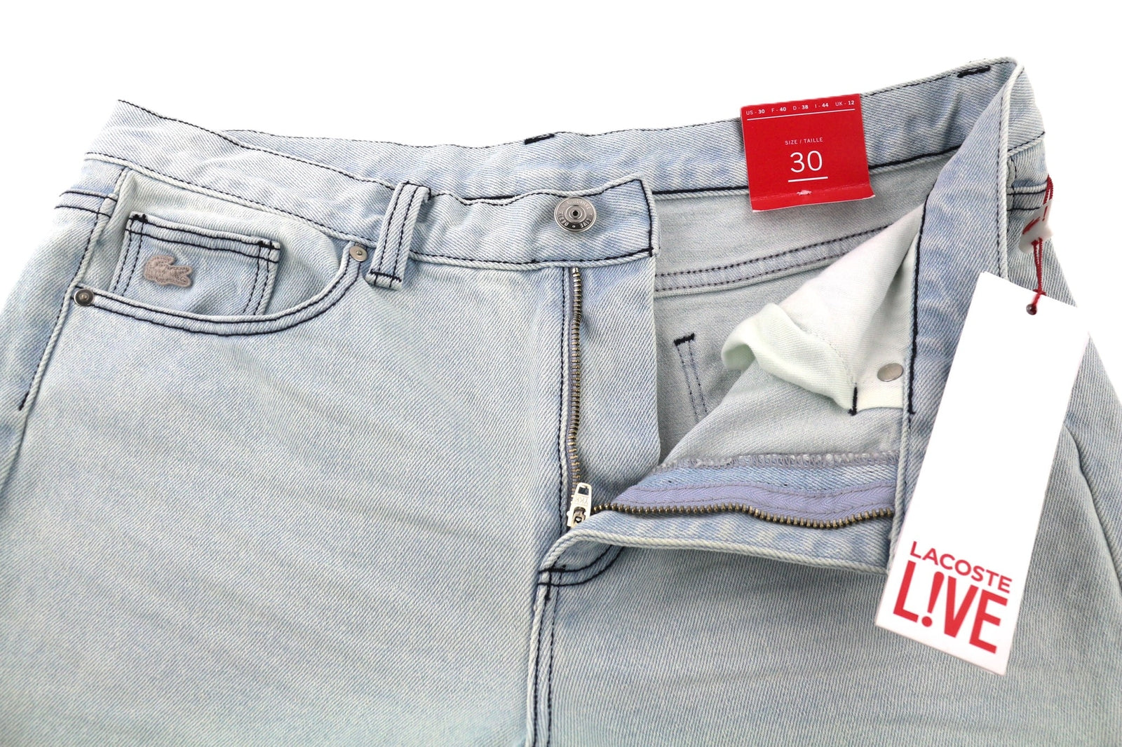LACOSTE HF2897 moteriški džinsai W30 skalbtos mėlynos medvilnės tamprūs, siaurėjantys 
