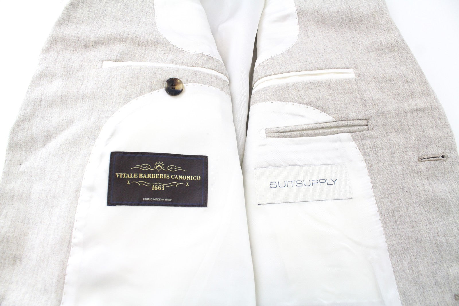 SUITSUPPLY Havana UK32R smėlio spalvos vyriškas švarkas su grynos vilnos pamušalu, vienaeilis 