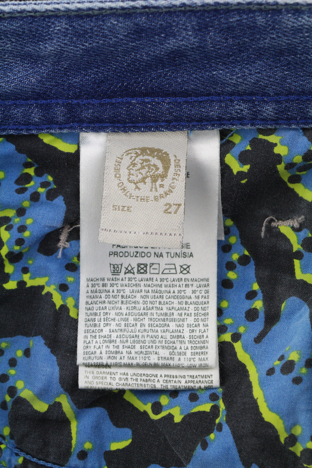 DIESEL Buster 084CM vyriški džinsai W27/L32 Regular Slim Tapered Wrapped Distressed 