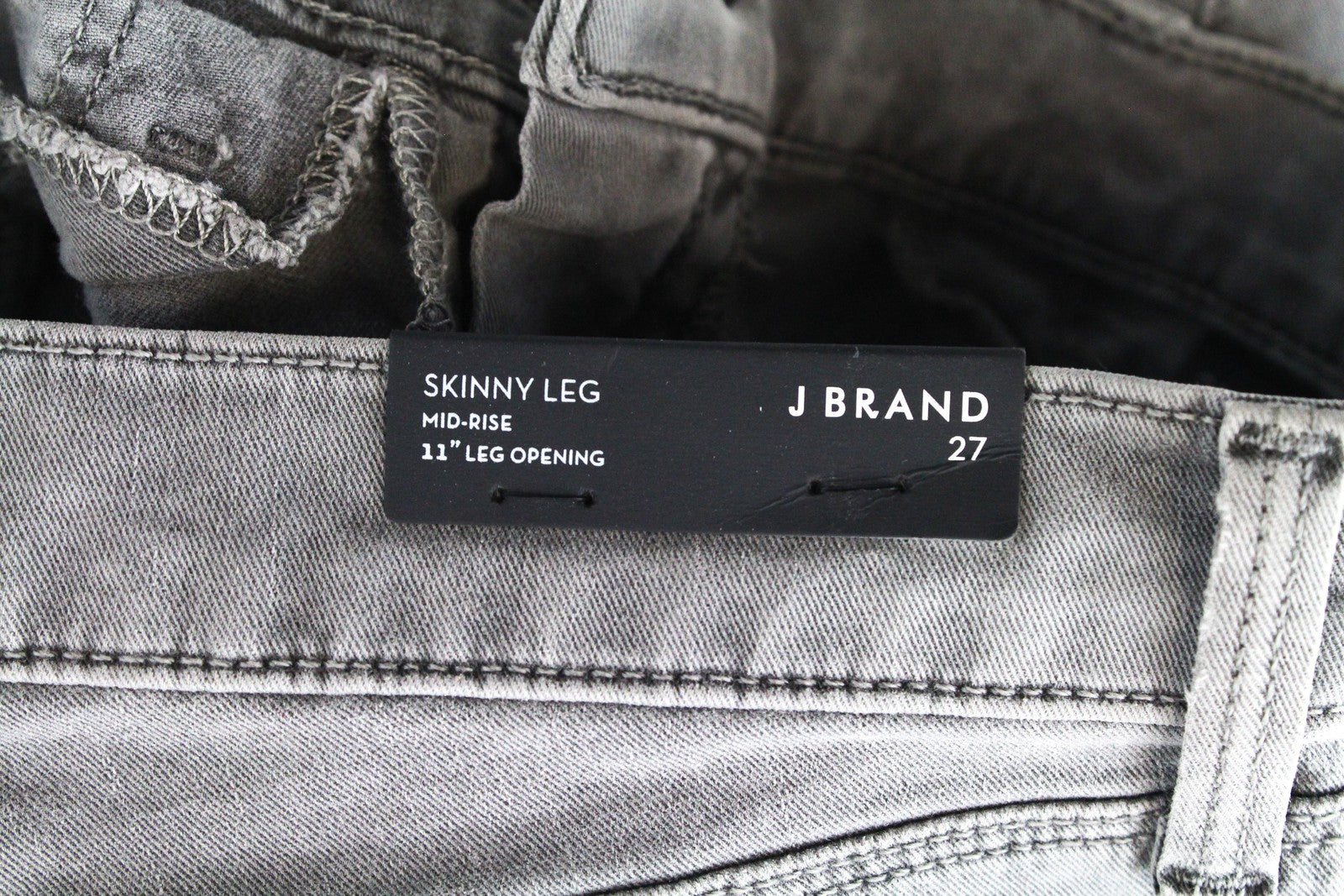 J BRAND aptempti pilki džinsai W27 tamprūs medvilniniai moteriški džinsai su plėšytais keliais 