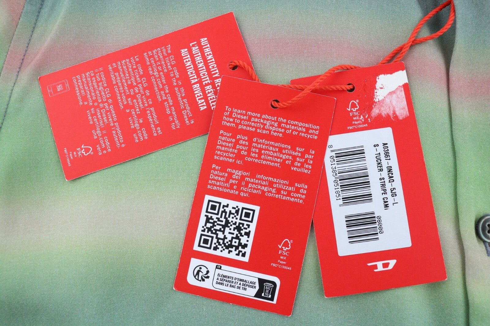 DIESEL vyriški marškinėliai su S formos juostele, L dydžio, raštuoti, su sagomis ir išskleidžiama apykakle. Rekomenduojama kaina – 150 €. 