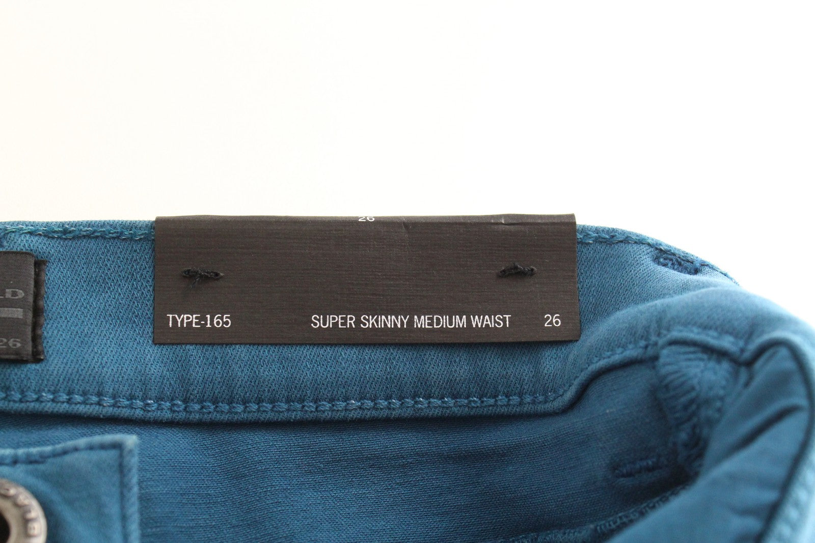 DIESEL BLACK GOLD Type-165A BG8JU moteriški W26 mėlyni aptempti tamprūs džinsai 