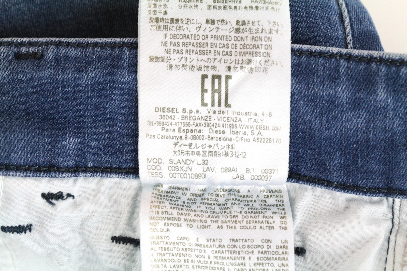 DIESEL Slandy 089AI moteriški džinsai W32/L32 itin aptempti, plėšyti, tamprūs, mėlyni 
