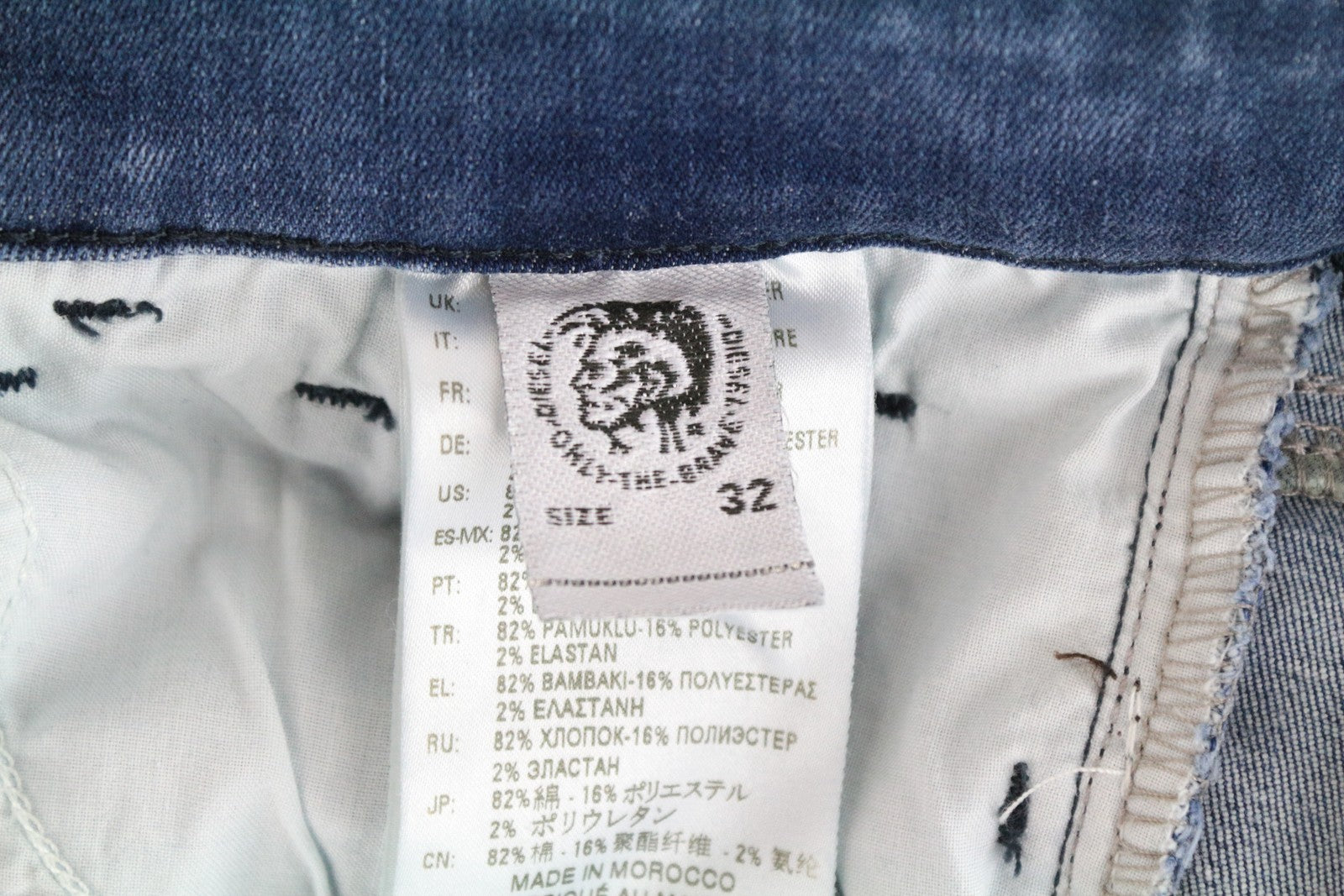 DIESEL Slandy 089AI moteriški džinsai W32/L32 itin aptempti, plėšyti, tamprūs, mėlyni 