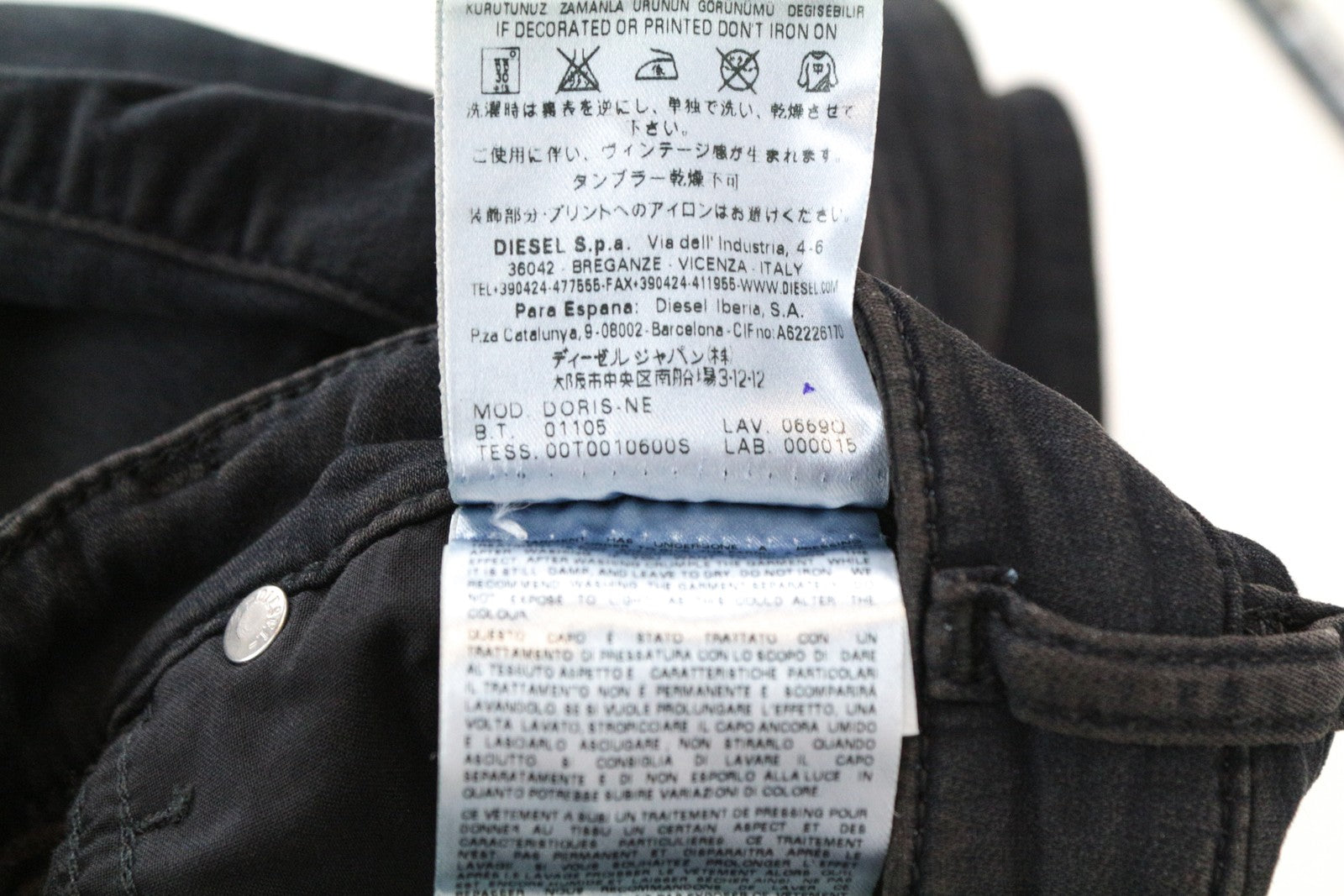 DIESEL Doris-NE 0669Q W30 mėlyni Jogg Slim Fit medvilniniai tamprūs džinsai 