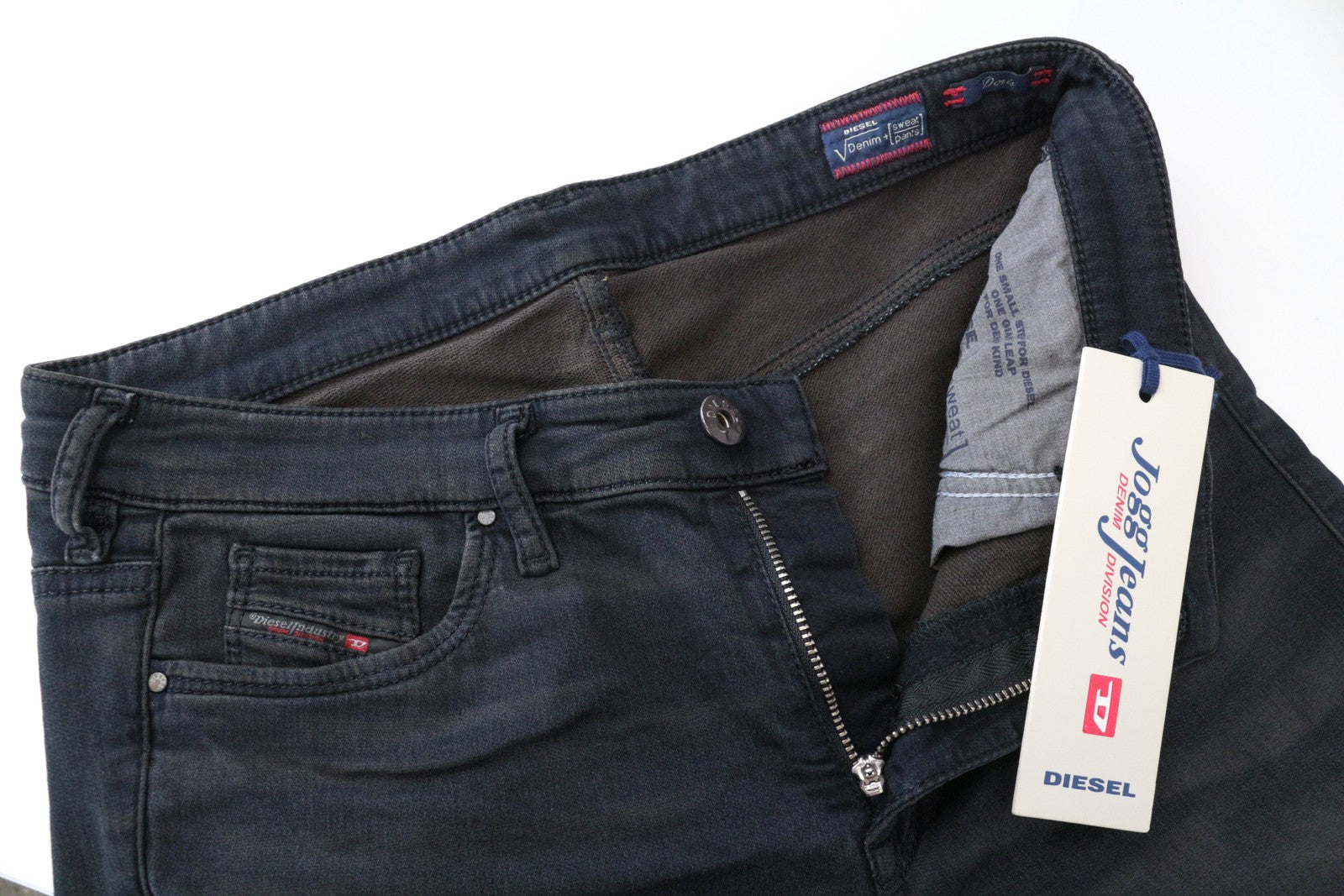 DIESEL Doris-NE 0669Q W30 mėlyni Jogg Slim Fit medvilniniai tamprūs džinsai 