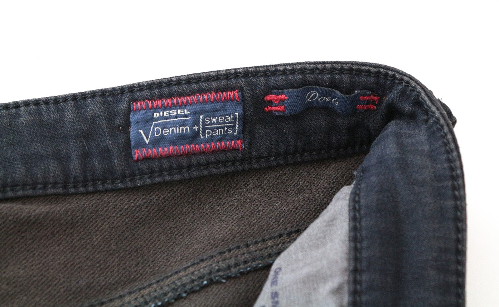 DIESEL Doris-NE 0669Q W30 mėlyni Jogg Slim Fit medvilniniai tamprūs džinsai 