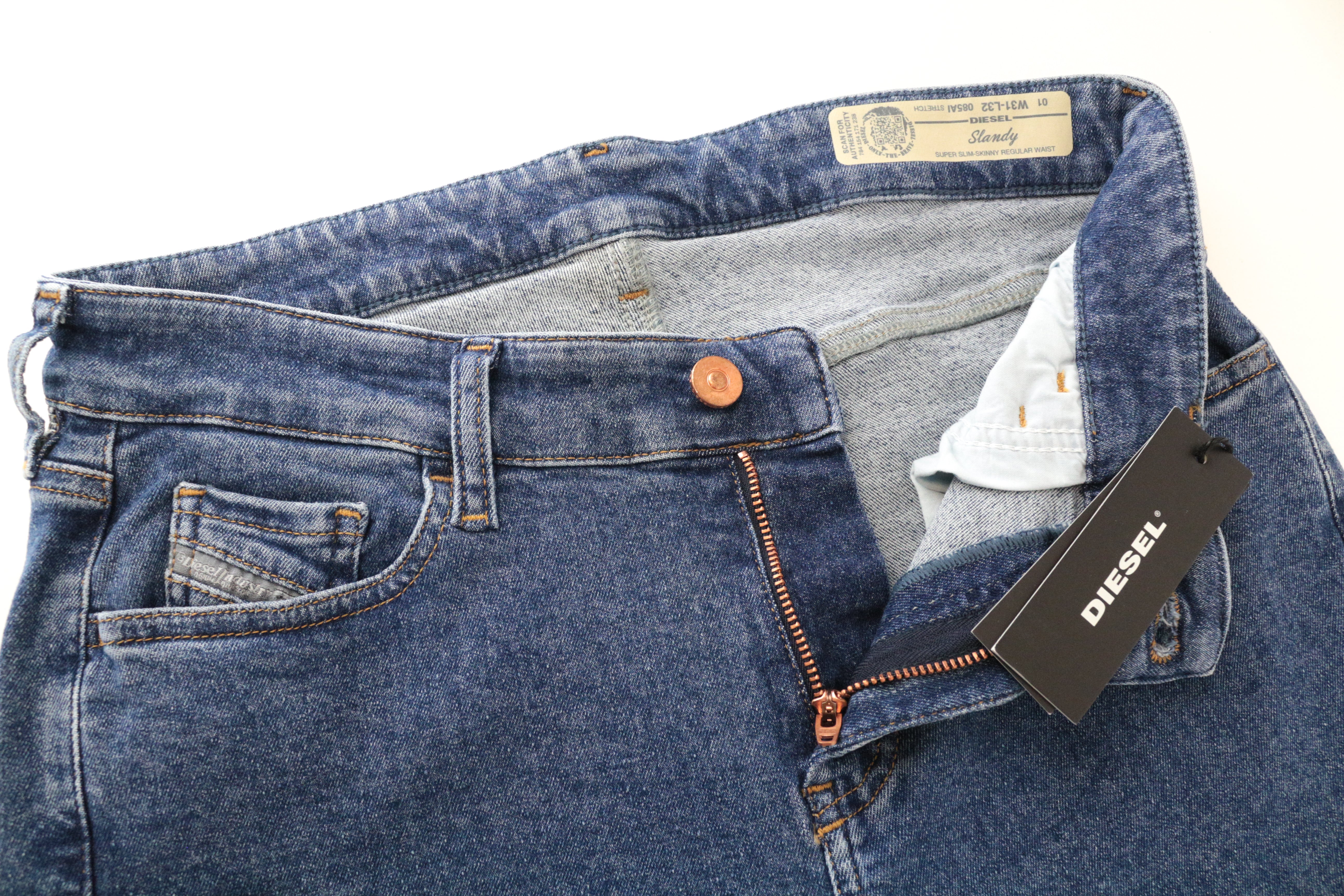 DIESEL Slandy 085AI moteriški mėlyni itin ploni tamprūs džinsai W31/L32 