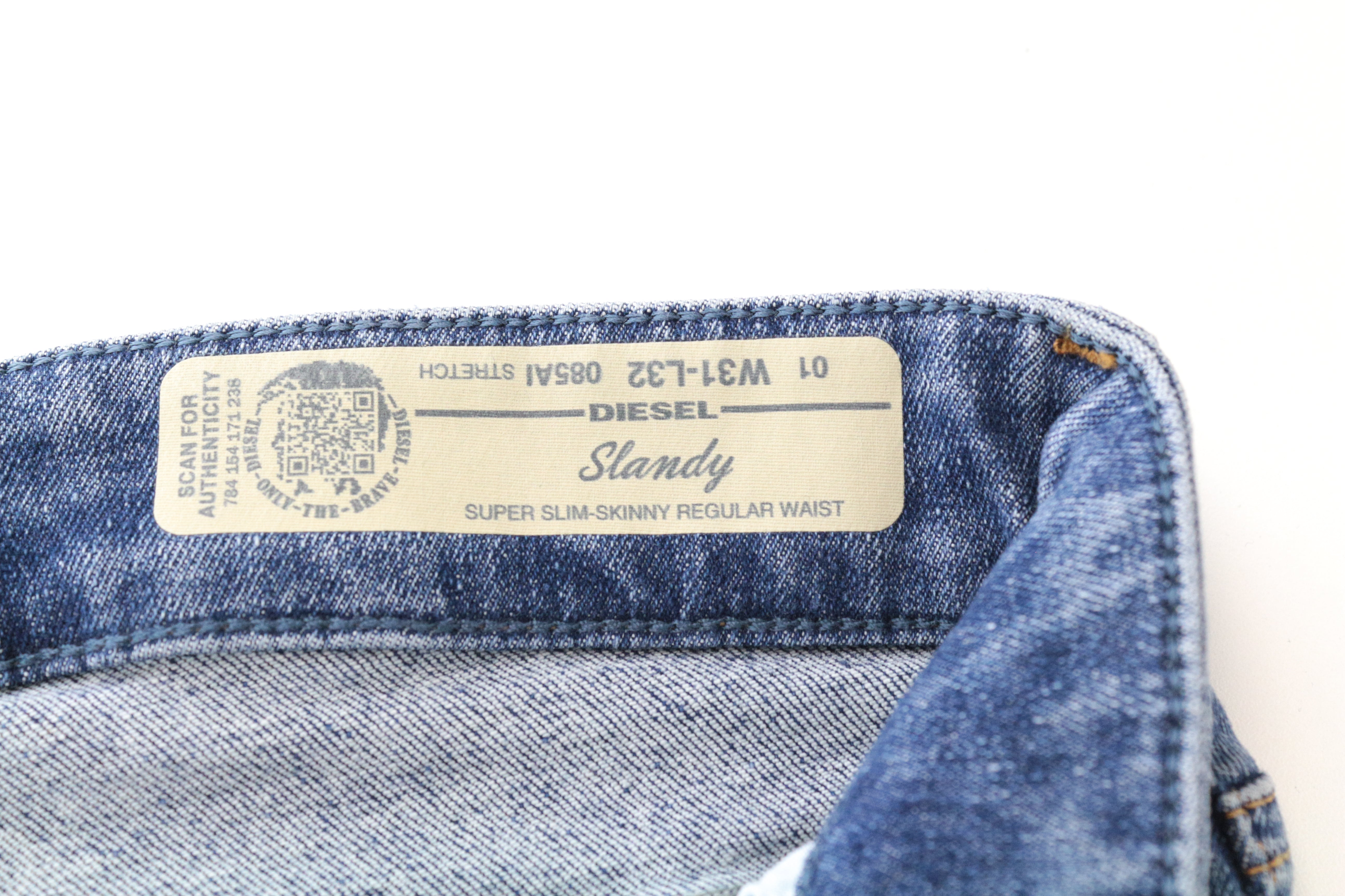 DIESEL Slandy 085AI moteriški mėlyni itin ploni tamprūs džinsai W31/L32 
