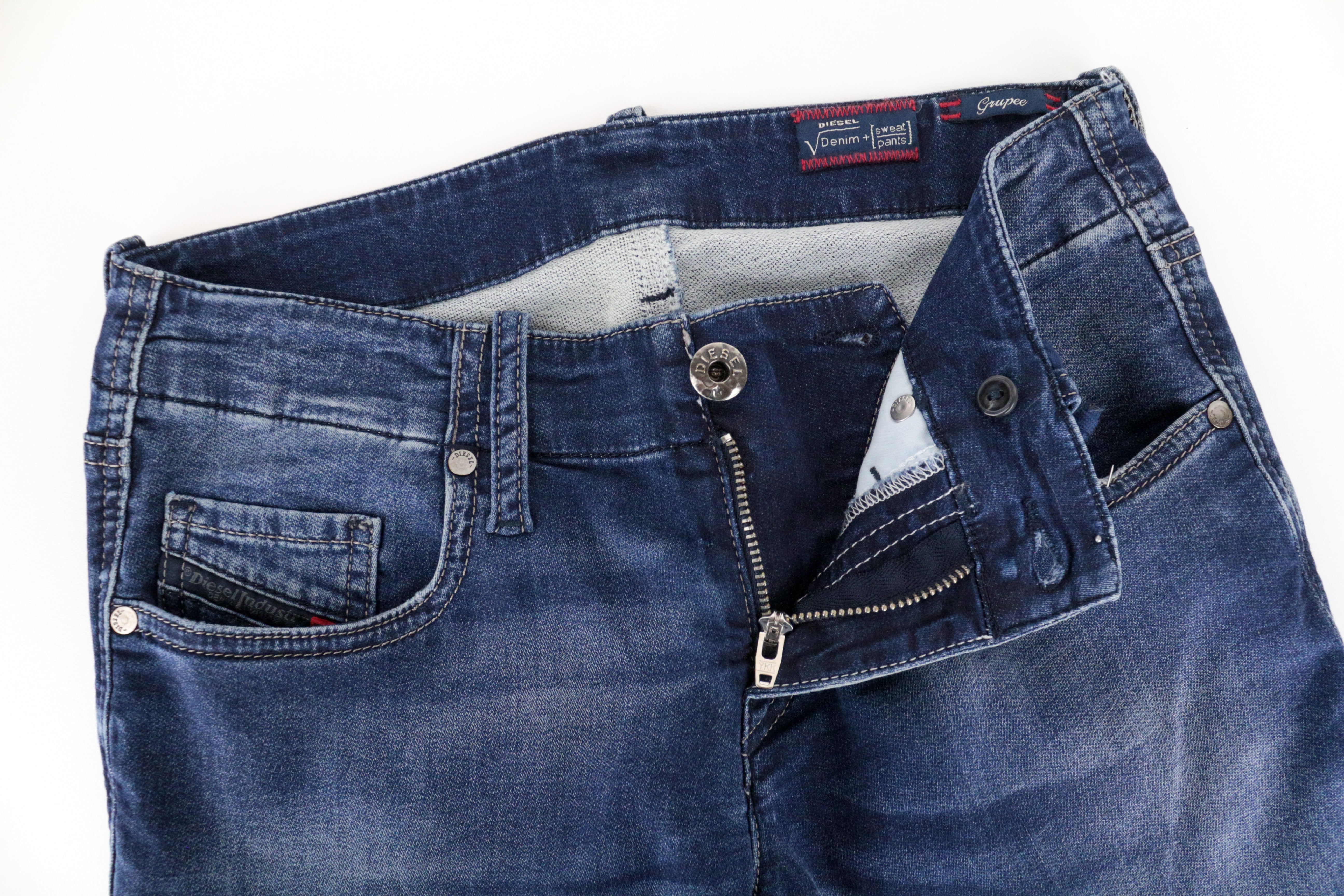 DIESEL Grupee-Ne 0674Y moteriškos W25 mėlynos medvilninės plonos, tamprios džinsinės jogg kelnės. 