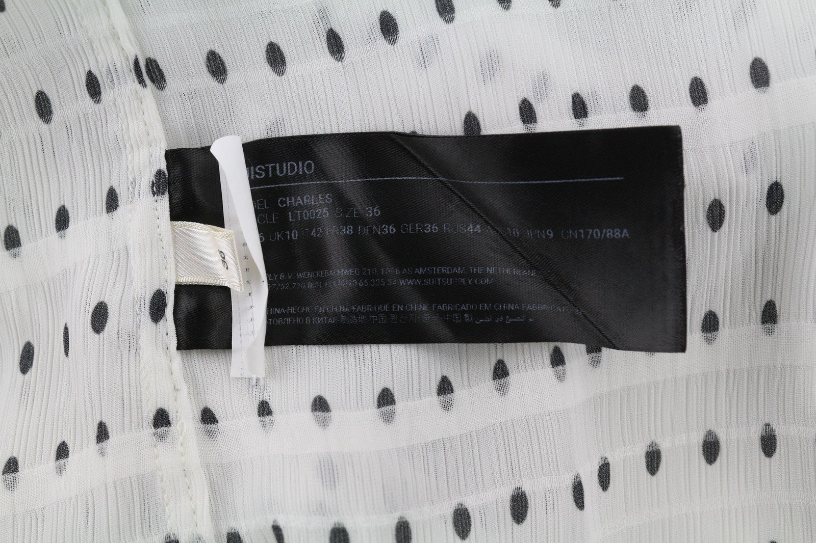 SUISTUDIO Charles moteriški marškinėliai UK10 balti taškuoti ilgomis rankovėmis, tamprūs 