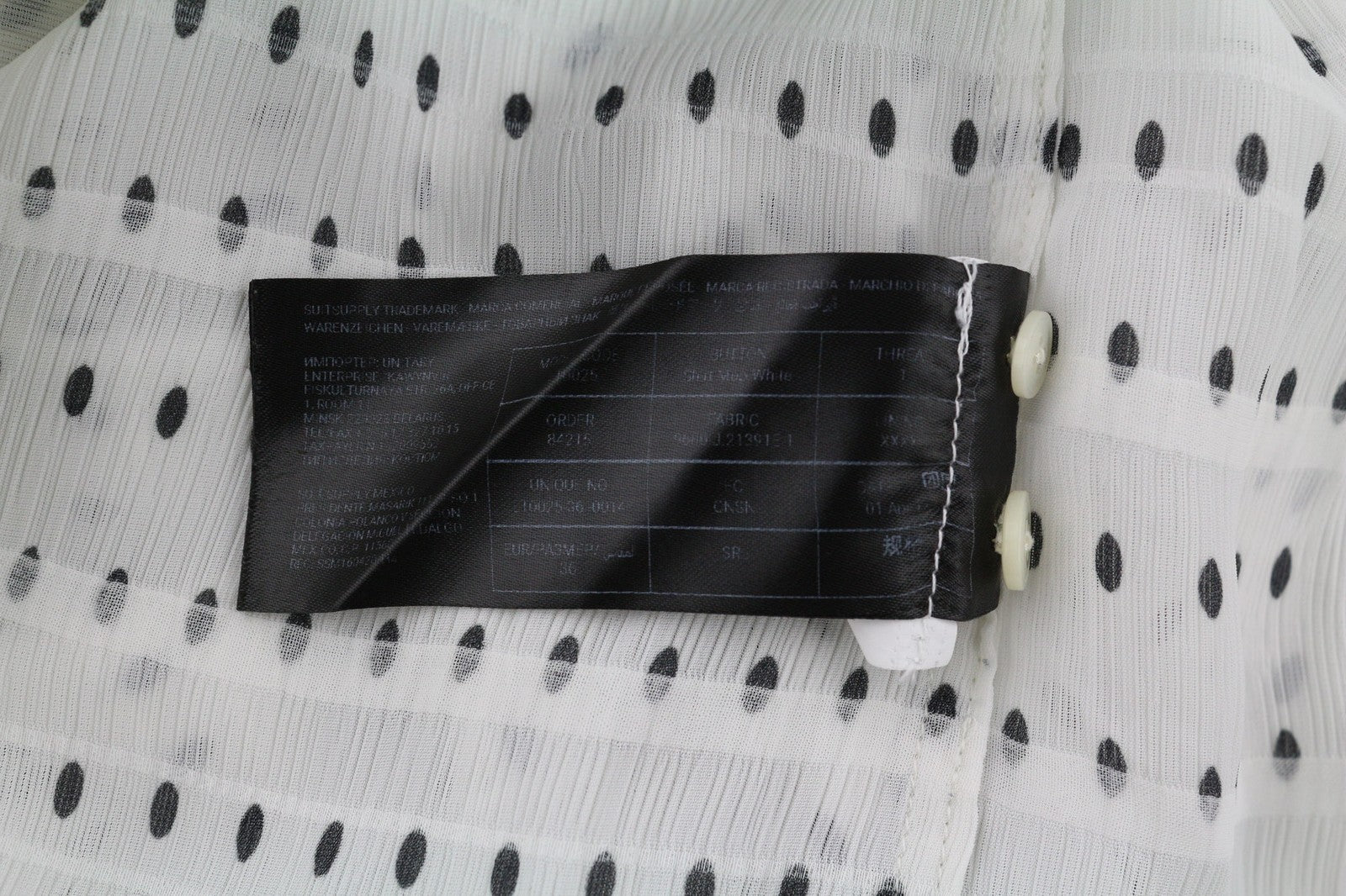 SUISTUDIO Charles moteriški marškinėliai UK10 balti taškuoti ilgomis rankovėmis, tamprūs 