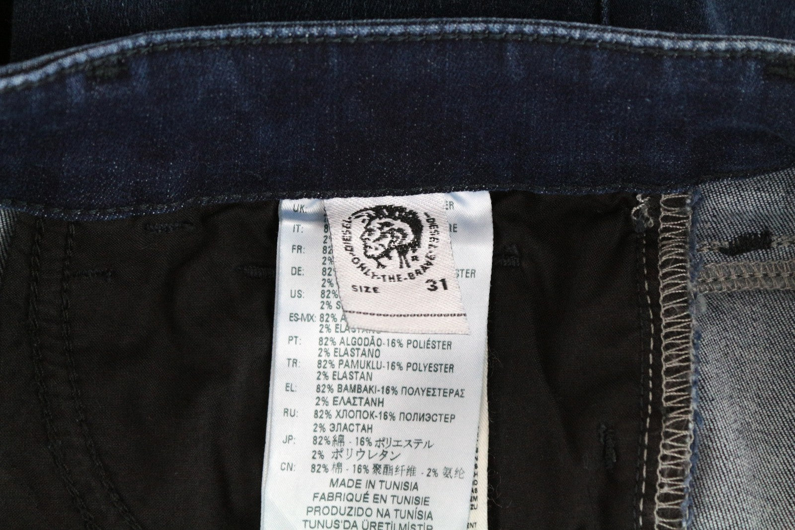 DIESEL Slandy 0890K W31 L32 moteriški tamprūs itin ploni tamsiai mėlyni džinsai 