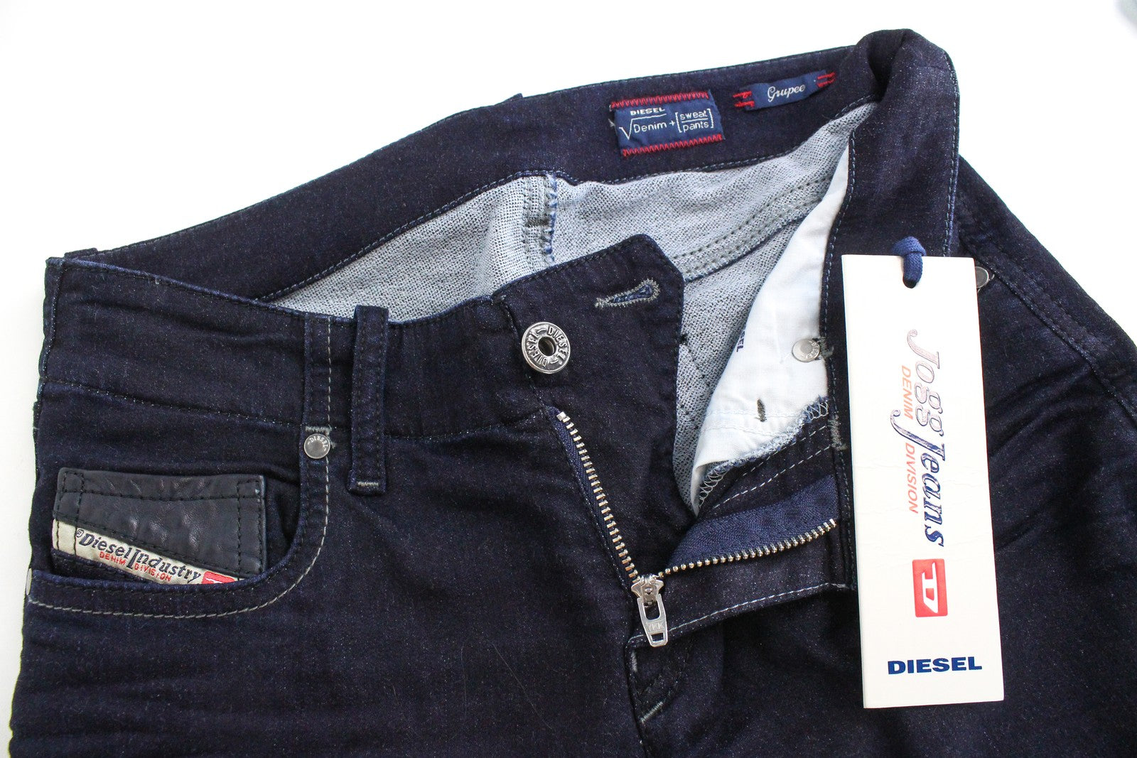 DIESEL Grupee-NE 0600V moteriškos W25 tamsiai mėlynos aptemptos džinsinės kelnės su užtrauktuku 