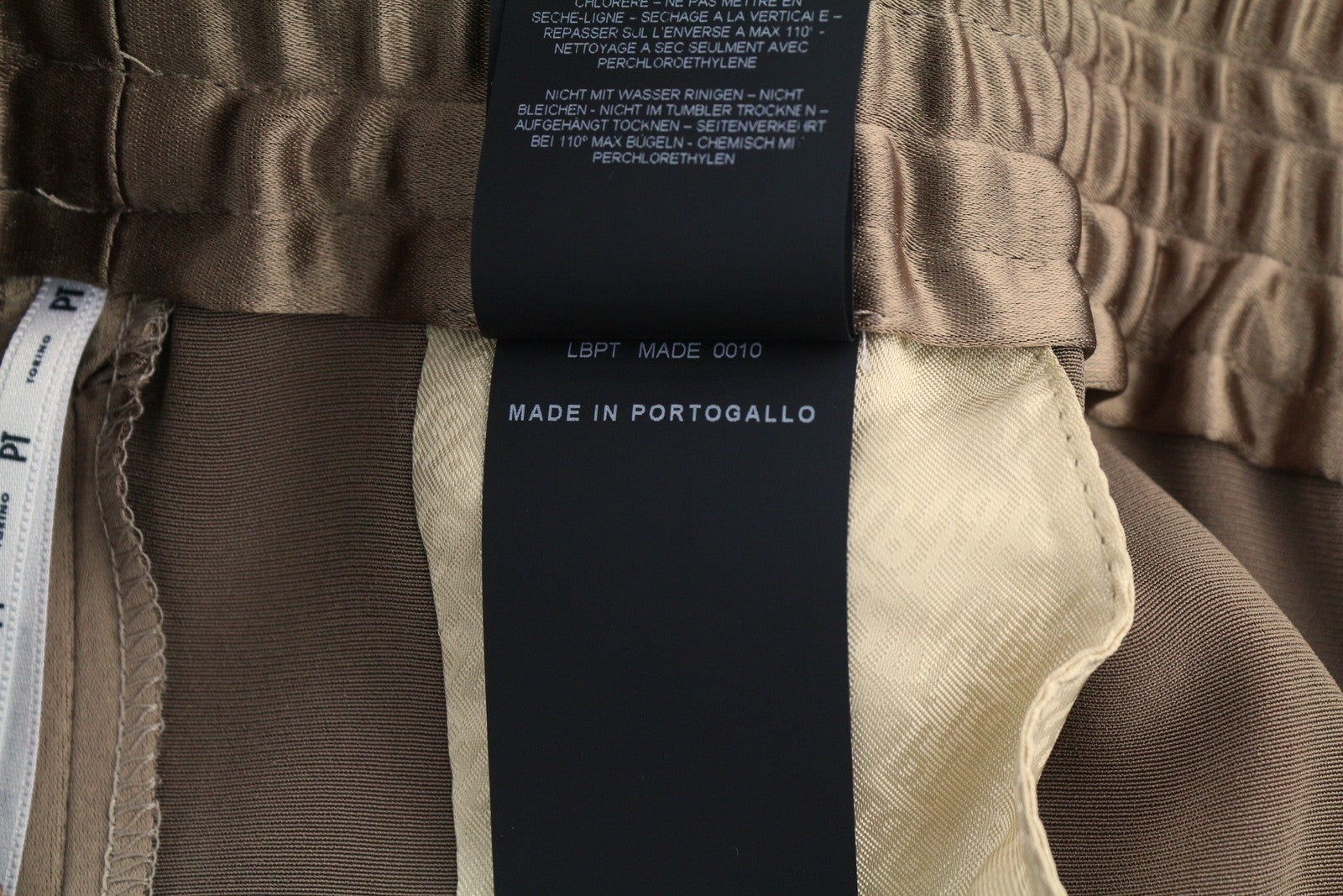 PT TORINO Lydia moteriškos kelnės, 46, rudos, blizgios, elastingu juosmeniu, platėjančiomis kišenėmis kojose. 