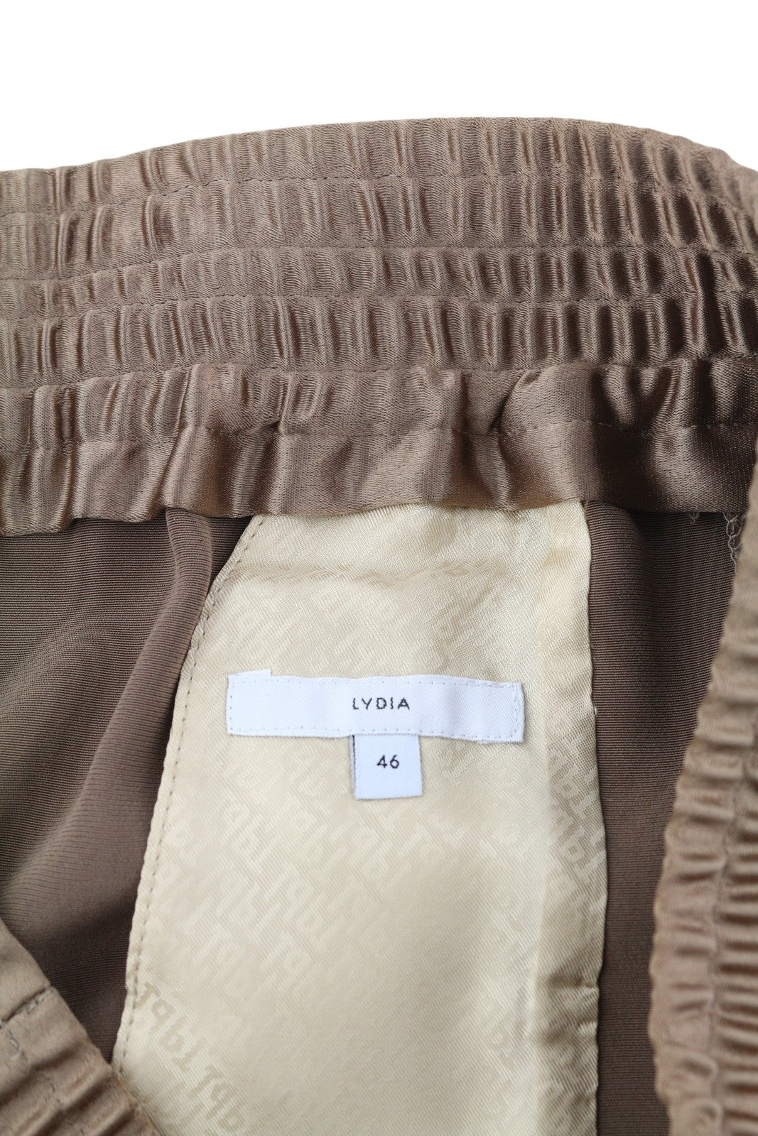 PT TORINO Lydia moteriškos kelnės, 46, rudos, blizgios, elastingu juosmeniu, platėjančiomis kišenėmis kojose. 