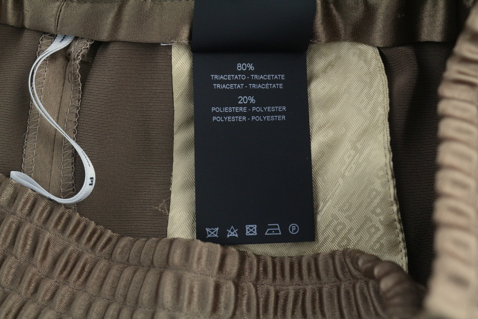 PT TORINO Lydia moteriškos kelnės, 40 dydis, rudos, blizgios, tamprios juosmens, platėjančios kišenės kojose. 