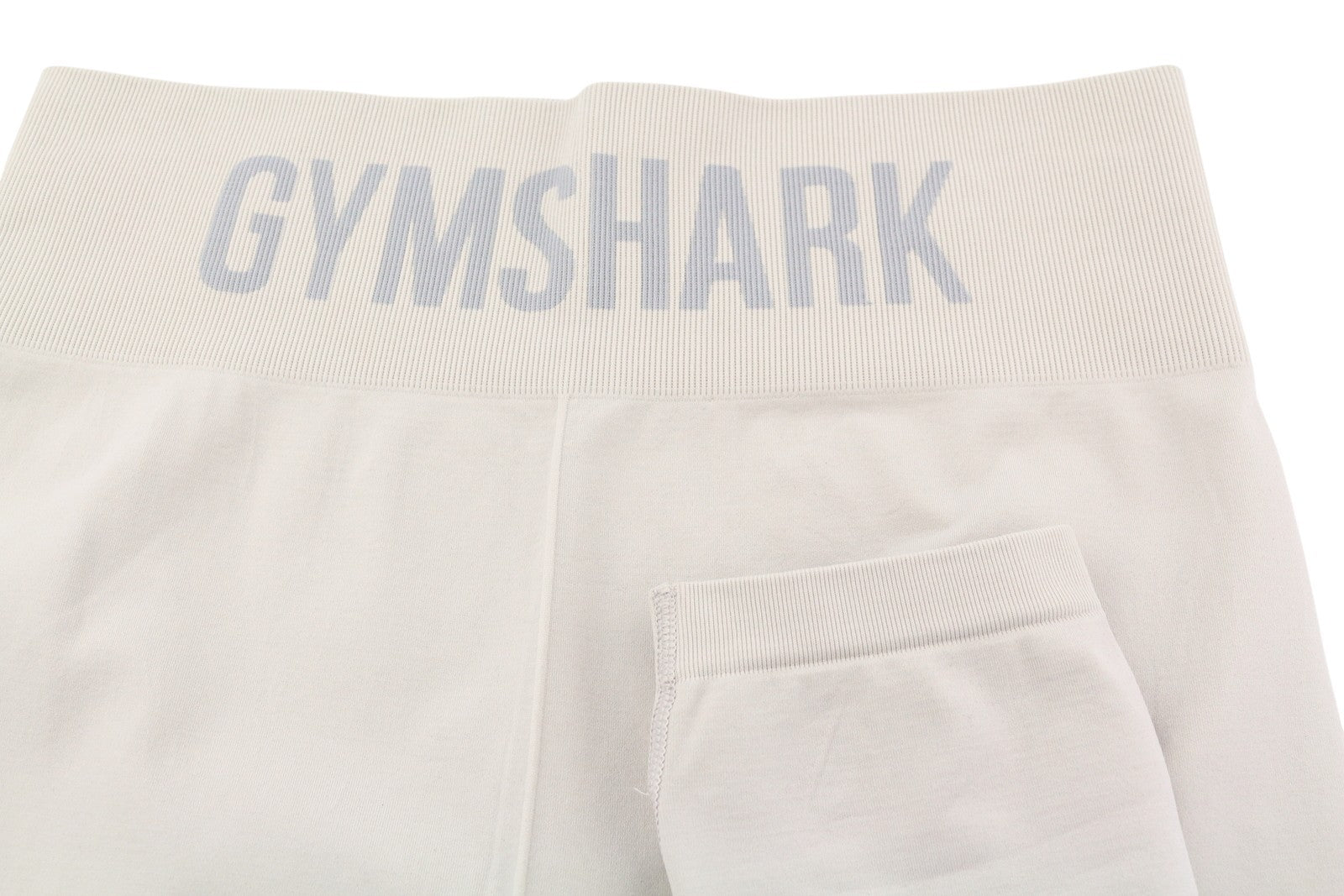 GYMSHARK GLLG4280 moteriškos tamprės S, smėlio spalvos, vidutinio juosmens, besiūlės, tamprios sportinės kelnės 