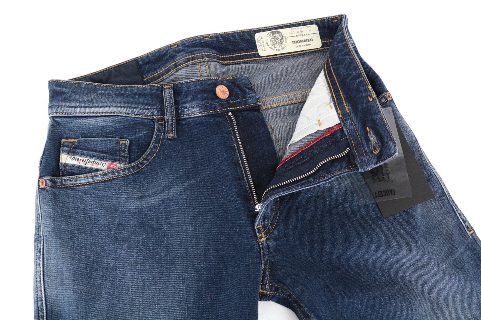 DIESEL Thommer 083AD vyriški W26/L32 mėlyni, aptempti, išblukinto kirpimo džinsai 