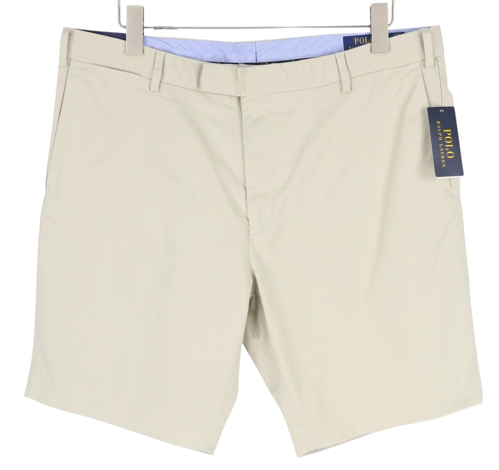 RALPH LAUREN Slim Stretch vyriški šortai, 38 cm, chino, smėlio spalvos, su užtrauktuku ir logotipu, rekomenduojama kaina – 180 € 