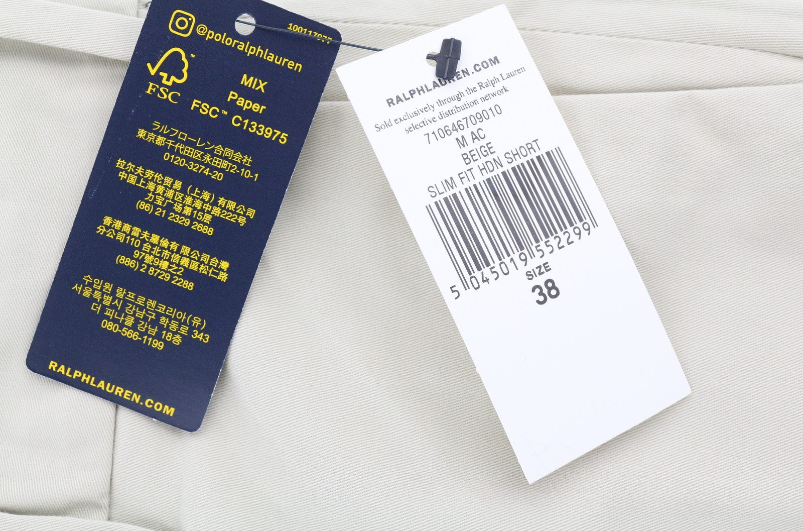 RALPH LAUREN Slim Stretch vyriški šortai, 38 cm, chino, smėlio spalvos, su užtrauktuku ir logotipu, rekomenduojama kaina – 180 € 