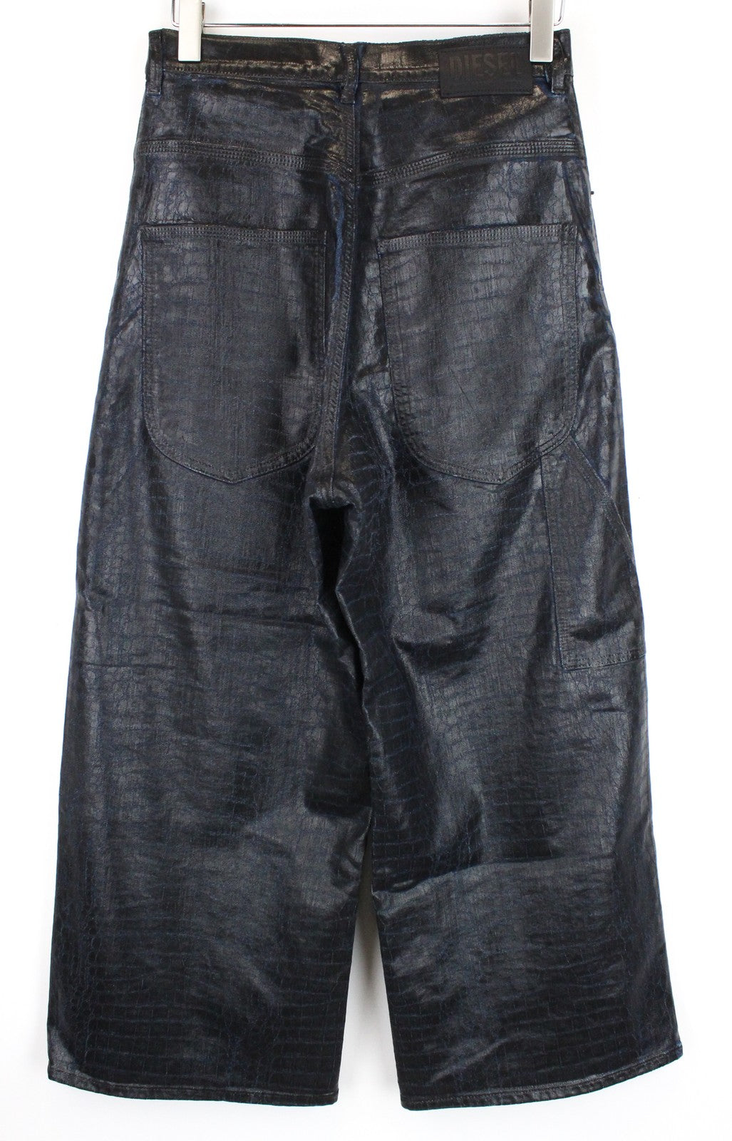 DIESEL D-Luite-SX-T 0094R W29 moteriški džinsai su gyvūnų raštu ir platėjančiomis sportinėmis kelnėmis, dengti gobtuvu. 