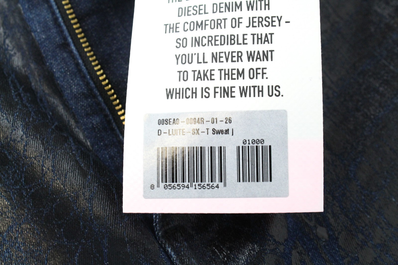 DIESEL D-Luite-SX-T 0094R W26 moteriški džinsai su platėjančiomis kelnėmis, dengti gyvūnų raštu 