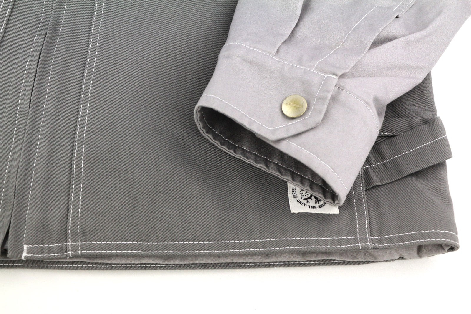 DIESEL J-Howe-LS vyriška striukė, pilka, su užtrauktuku ir pamušalu, kaina – 450 € 